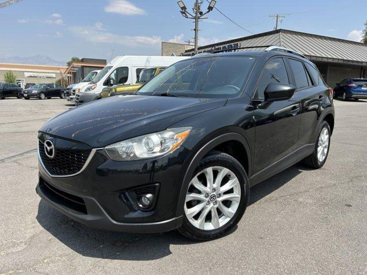 2014 Jet Black Mica /Black Mazda CX-5 (JM3KE4DY7E0) with an 4 2.5 L engine, Automatic transmission, located at 3240 Washington Blvd., Ogden, 84401, (801) 621-7177, 41.204967, -111.969994 - *2014 Mazda CX-5 AWD Grand Touring*Sherm's Store is a family owned and operated independent auto dealer that has become a household name serving Utah for over 50 years! We specialize in excellent condition, pre-owned vehicles. Here at Sherm's, we never mark up interest rates! This means that what yo - Photo#0