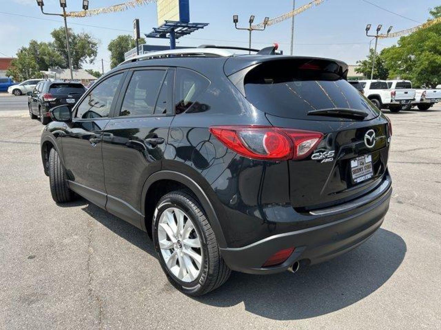 2014 Jet Black Mica /Black Mazda CX-5 (JM3KE4DY7E0) with an 4 2.5 L engine, Automatic transmission, located at 3240 Washington Blvd., Ogden, 84401, (801) 621-7177, 41.204967, -111.969994 - *2014 Mazda CX-5 AWD Grand Touring*Sherm's Store is a family owned and operated independent auto dealer that has become a household name serving Utah for over 50 years! We specialize in excellent condition, pre-owned vehicles. Here at Sherm's, we never mark up interest rates! This means that what yo - Photo#6