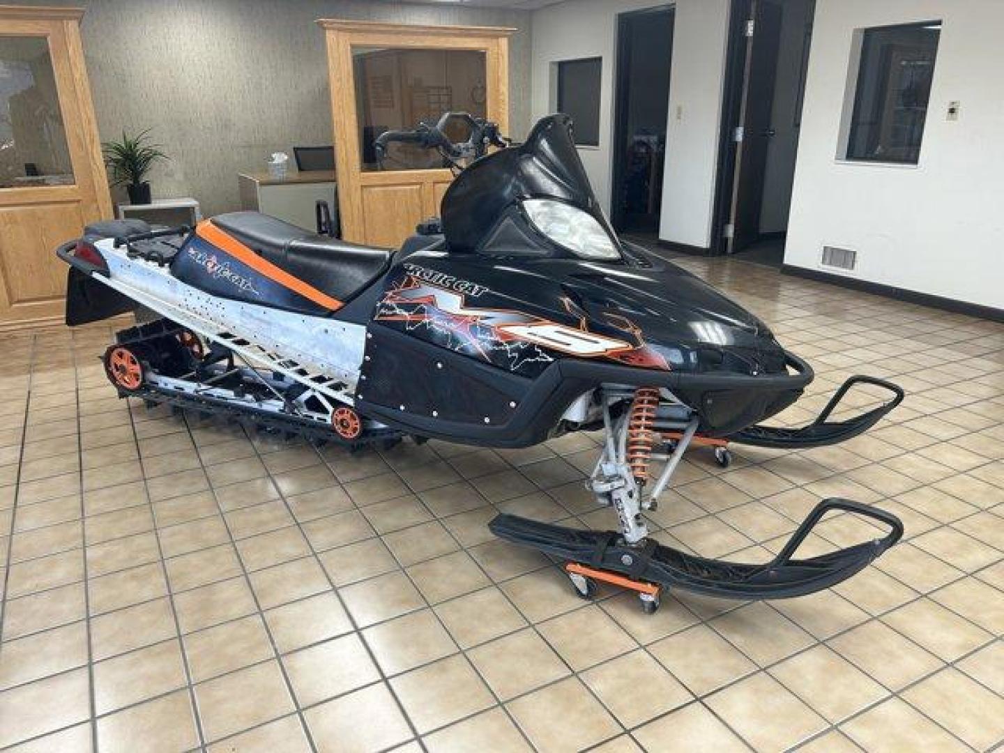 2007 Black/Orange Arctic Cat M8 EFI 153 (4UF07SNW97T) , located at 3240 Washington Blvd., Ogden, 84401, (801) 621-7177, 41.204967, -111.969994 - *2007 Artic Cat M8 EFI 153*Experience winter like never before with this 2007 Arctic Cat M8 EFI 153! This high-performance snowmobile is perfect for both trail riding and deep powder adventures, delivering power and agility that enthusiasts crave.*Key Features:* * *Engine:* 800cc EFI (Electronic Fu - Photo#2