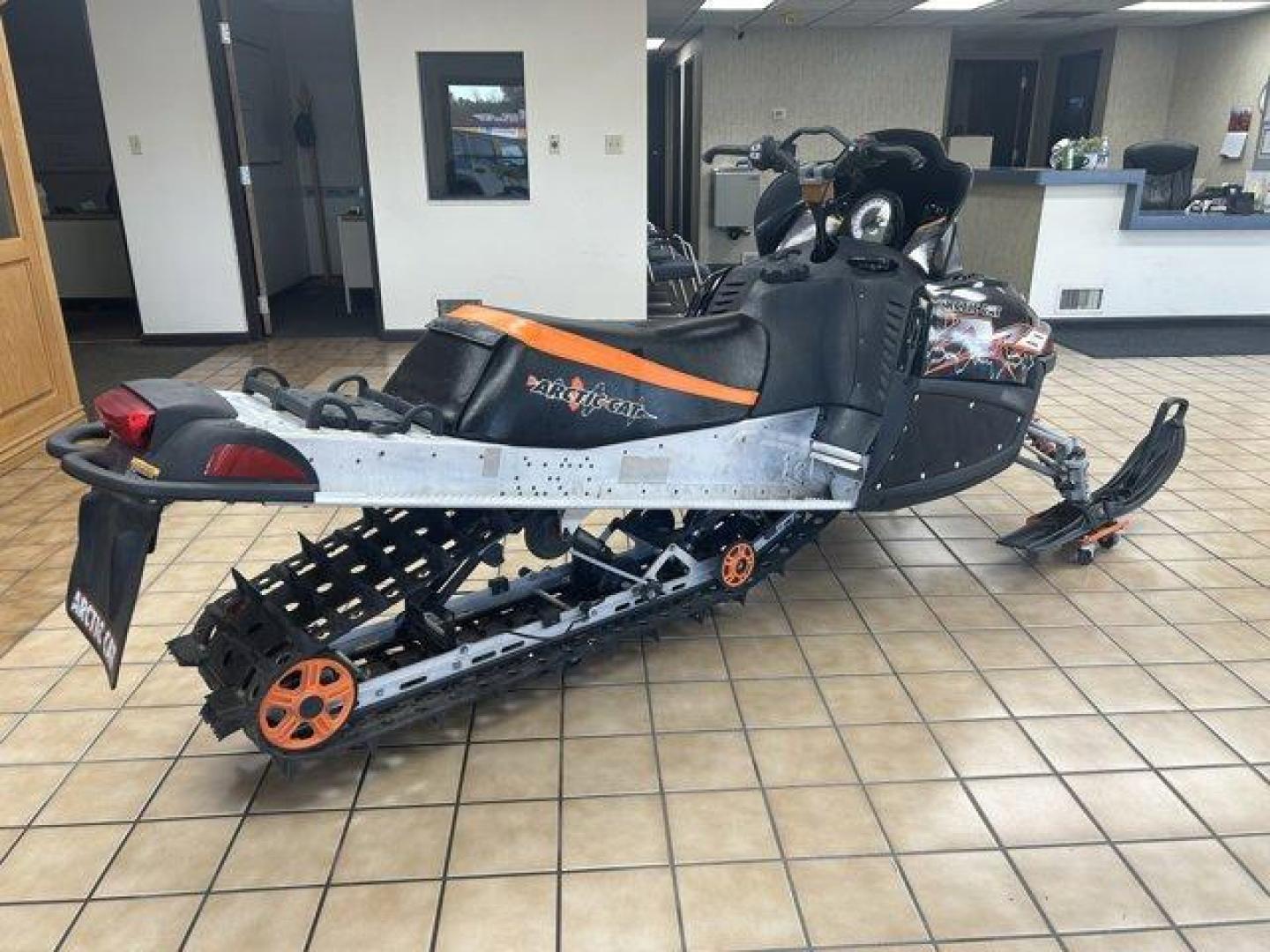 2007 Black/Orange Arctic Cat M8 EFI 153 (4UF07SNW97T) , located at 3240 Washington Blvd., Ogden, 84401, (801) 621-7177, 41.204967, -111.969994 - *2007 Artic Cat M8 EFI 153*Experience winter like never before with this 2007 Arctic Cat M8 EFI 153! This high-performance snowmobile is perfect for both trail riding and deep powder adventures, delivering power and agility that enthusiasts crave.*Key Features:* * *Engine:* 800cc EFI (Electronic Fu - Photo#3