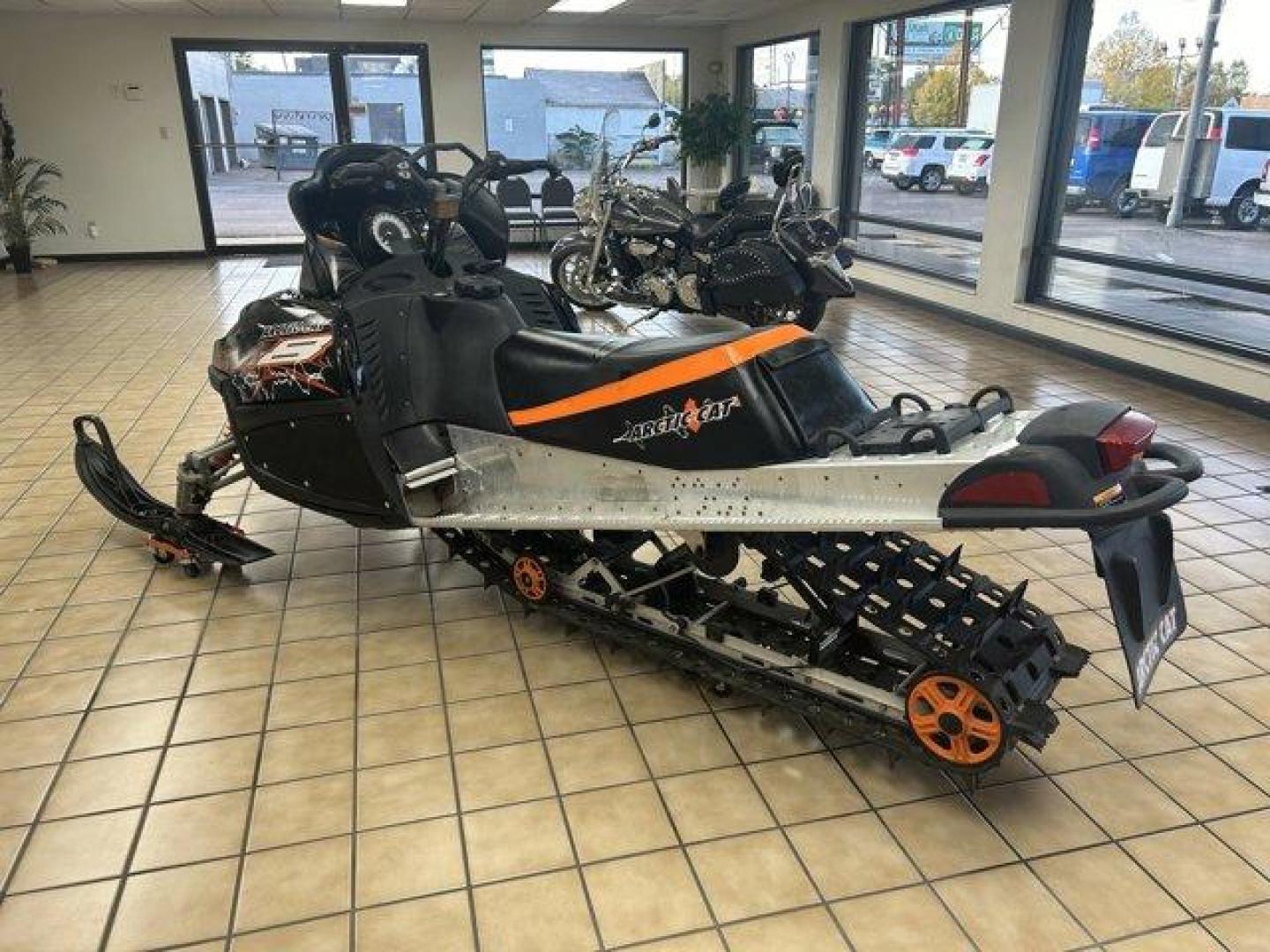 2007 Black/Orange Arctic Cat M8 EFI 153 (4UF07SNW97T) , located at 3240 Washington Blvd., Ogden, 84401, (801) 621-7177, 41.204967, -111.969994 - *2007 Artic Cat M8 EFI 153*Experience winter like never before with this 2007 Arctic Cat M8 EFI 153! This high-performance snowmobile is perfect for both trail riding and deep powder adventures, delivering power and agility that enthusiasts crave.*Key Features:* * *Engine:* 800cc EFI (Electronic Fu - Photo#5