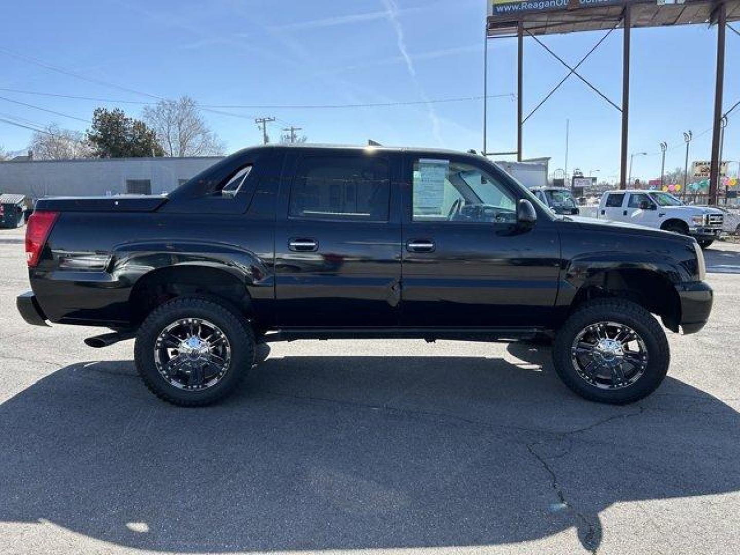 2004 Black Raven /Shale Cadillac Escalade EXT (3GYEK62N14G) with an 8 6.0L engine, Automatic transmission, located at 3240 Washington Blvd., Ogden, 84401, (801) 621-7177, 41.204967, -111.969994 - Photo#3