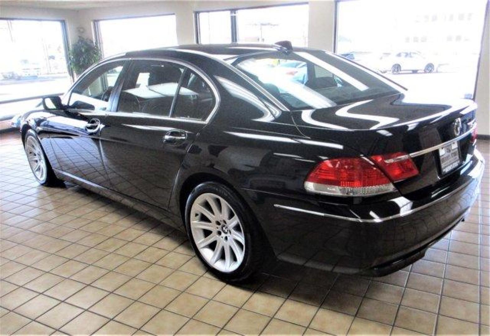 2006 Jet Black BMW 7 Series (WBAHN83576D) with an 8 4.8L engine, Automatic transmission, located at 3240 Washington Blvd., Ogden, 84401, (801) 621-7177, 41.204967, -111.969994 - 2006 BMW 7 Series 750LiSherm' Store Crew is Excited to Offer this Clean Title, No Accident, 7 Series BMW, to Our New and Repeat Customers!Features Include:Rear Wheel Drive, Factory Aluminum Alloy Wheels, Sun Roof, HID headlights, Headlights-Auto-Leveling, Fog Lamps, Heated Power Mirrors, Rain Sensin - Photo#5