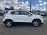 2020 Summit White /Jet Black Chevrolet Trax (KL7CJNSB7LB) with an 4 1.4L engine, Automatic transmission, located at 3240 Washington Blvd., Ogden, 84401, (801) 621-7177, 41.204967, -111.969994 - Discover the perfect blend of style, efficiency, and versatility with this 2020 Chevrolet Trax! Ideal for city driving and weekend getaways, this compact SUV offers a spacious interior, advanced technology, and a smooth ride.*Key Features:* * *Mileage:* 50153 * *Engine:* 1.4L Turbocharged 4-cylind - Photo#3