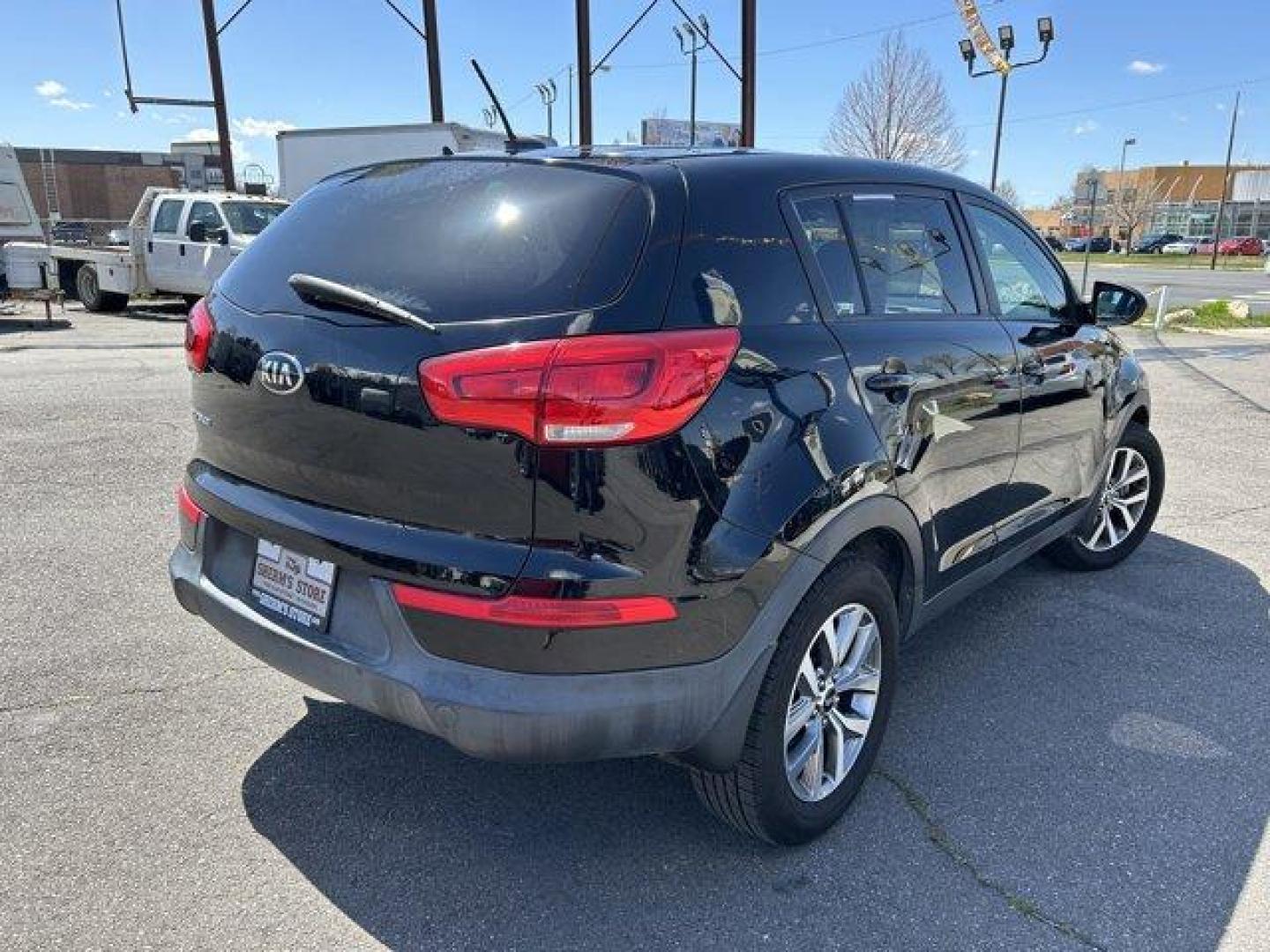 2015 Black Cherry /Black Kia Sportage (KNDPBCAC6F7) with an 4 2.4 L engine, Automatic transmission, located at 3240 Washington Blvd., Ogden, 84401, (801) 621-7177, 41.204967, -111.969994 - Photo#4