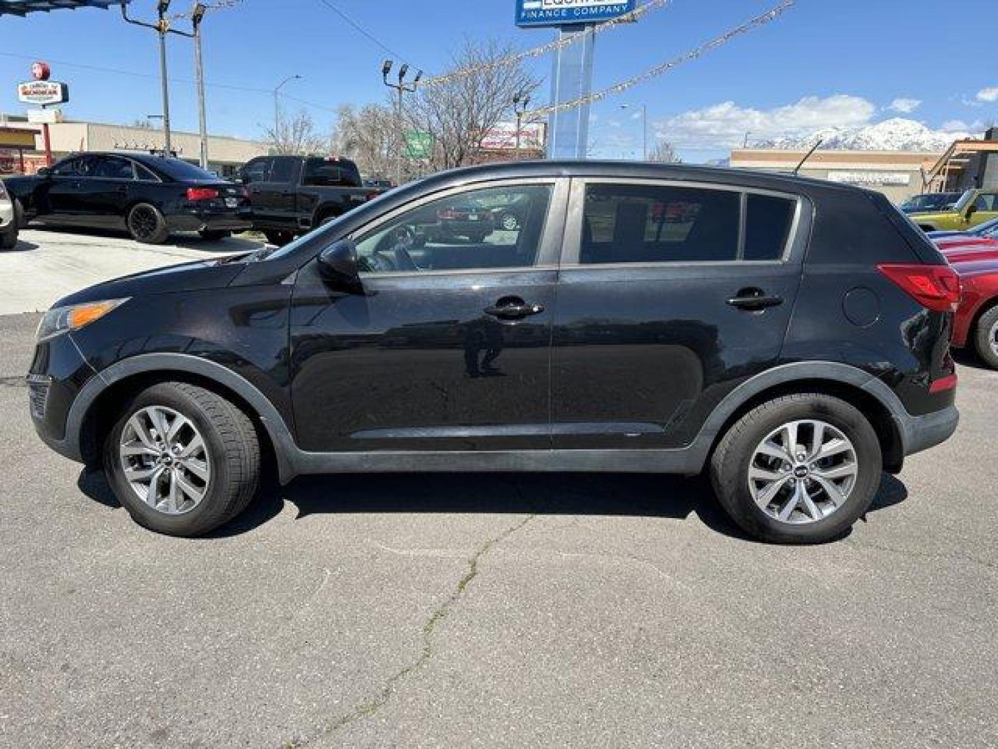 2015 Black Cherry /Black Kia Sportage (KNDPBCAC6F7) with an 4 2.4 L engine, Automatic transmission, located at 3240 Washington Blvd., Ogden, 84401, (801) 621-7177, 41.204967, -111.969994 - Photo#7