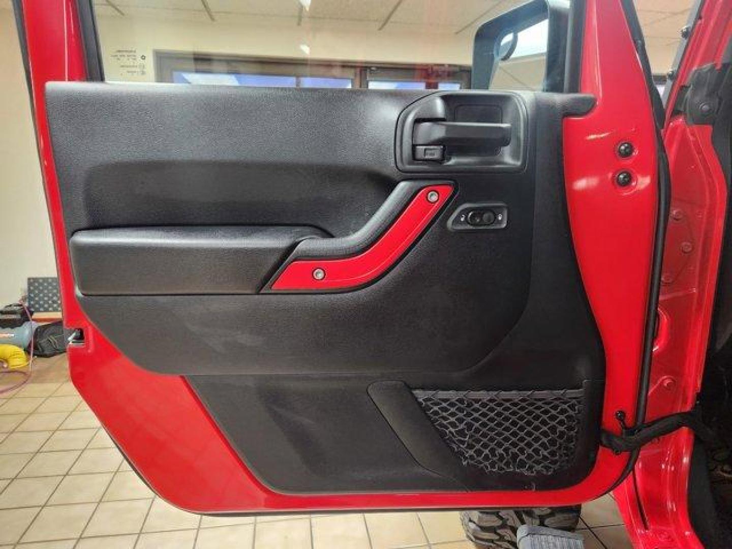 2017 Firecracker Red Clearcoat /Black Jeep Wrangler Unlimited (1C4BJWDG6HL) with an 6 3.6 L engine, Automatic transmission, located at 3240 Washington Blvd., Ogden, 84401, (801) 621-7177, 41.204967, -111.969994 - *2017 Jeep Wrangler Unlimited Sport 4x4*Sherm's Store is a family owned and operated independent auto dealer that has become a household name serving Utah for over 50 years! We specialize in excellent condition, pre-owned vehicles. Here at Sherm's, we never mark up interest rates! This means that wh - Photo#7