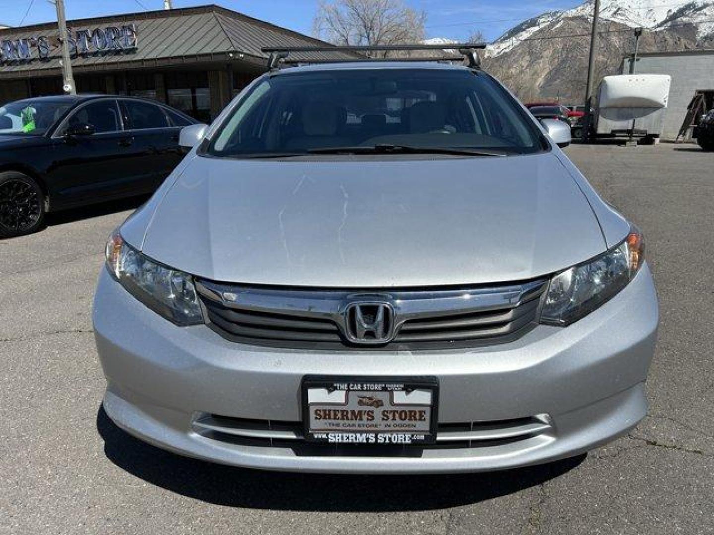 2012 Honda Civic Sdn (2HGFB2F55CH) with an 4 1.8L engine, Automatic transmission, located at 3240 Washington Blvd., Ogden, 84401, (801) 621-7177, 41.204967, -111.969994 - *2012 Honda Civic Sdn 4dr Auto LX*Sherm's Store is a family owned and operated independent auto dealer that has become a household name serving Utah for over 50 years! We specialize in excellent condition, pre-owned vehicles. Here at Sherm's, we never mark up interest rates! This means that what you - Photo#1