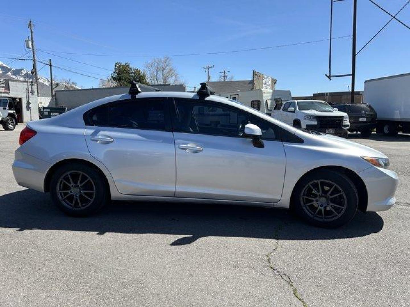 2012 Honda Civic Sdn (2HGFB2F55CH) with an 4 1.8L engine, Automatic transmission, located at 3240 Washington Blvd., Ogden, 84401, (801) 621-7177, 41.204967, -111.969994 - Photo#3