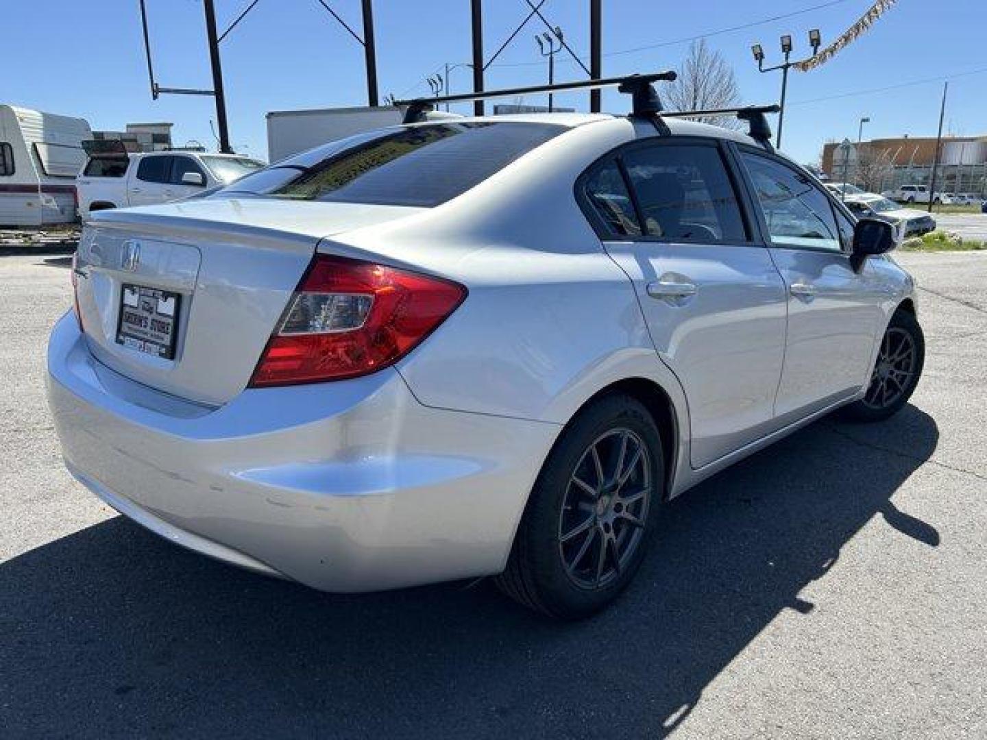 2012 Honda Civic Sdn (2HGFB2F55CH) with an 4 1.8L engine, Automatic transmission, located at 3240 Washington Blvd., Ogden, 84401, (801) 621-7177, 41.204967, -111.969994 - *2012 Honda Civic Sdn 4dr Auto LX*Sherm's Store is a family owned and operated independent auto dealer that has become a household name serving Utah for over 50 years! We specialize in excellent condition, pre-owned vehicles. Here at Sherm's, we never mark up interest rates! This means that what you - Photo#4