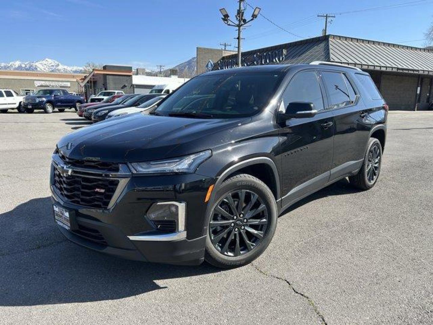 2023 Mosaic Black Metallic /Jet Black/Spice Red Chevrolet Traverse (1GNEVJKW0PJ) with an 6 3.6L engine, Automatic transmission, located at 3240 Washington Blvd., Ogden, 84401, (801) 621-7177, 41.204967, -111.969994 - *2023 Chevrolet Traverse AWD 4dr RS*Loaded, low miles, one owner and super clean. All service done at Chevy dealer.Dual sunroof, leather, heated front seats, heated steering wheel, heated power folding side mirrors, all-weather floor mats, power lift gate with programmable height, Bose sound system - Photo#0