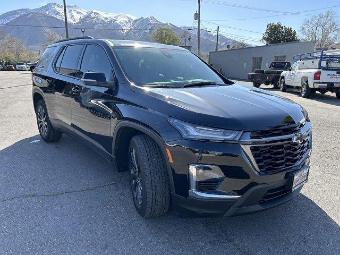 2023 Mosaic Black Metallic /Jet Black/Spice Red Chevrolet Traverse (1GNEVJKW0PJ) with an 6 3.6L engine, Automatic transmission, located at 3240 Washington Blvd., Ogden, 84401, (801) 621-7177, 41.204967, -111.969994 - *2023 Chevrolet Traverse AWD 4dr RS*Loaded, low miles, one owner and super clean. All service done at Chevy dealer.Dual sunroof, leather, heated front seats, heated steering wheel, heated power folding side mirrors, all-weather floor mats, power lift gate with programmable height, Bose sound system - Photo#2