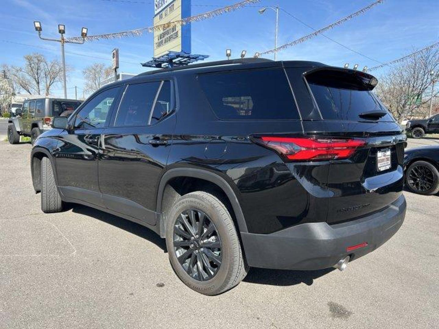 2023 Mosaic Black Metallic /Jet Black/Spice Red Chevrolet Traverse (1GNEVJKW0PJ) with an 6 3.6L engine, Automatic transmission, located at 3240 Washington Blvd., Ogden, 84401, (801) 621-7177, 41.204967, -111.969994 - *2023 Chevrolet Traverse AWD 4dr RS*Loaded, low miles, one owner and super clean. All service done at Chevy dealer.Dual sunroof, leather, heated front seats, heated steering wheel, heated power folding side mirrors, all-weather floor mats, power lift gate with programmable height, Bose sound system - Photo#6