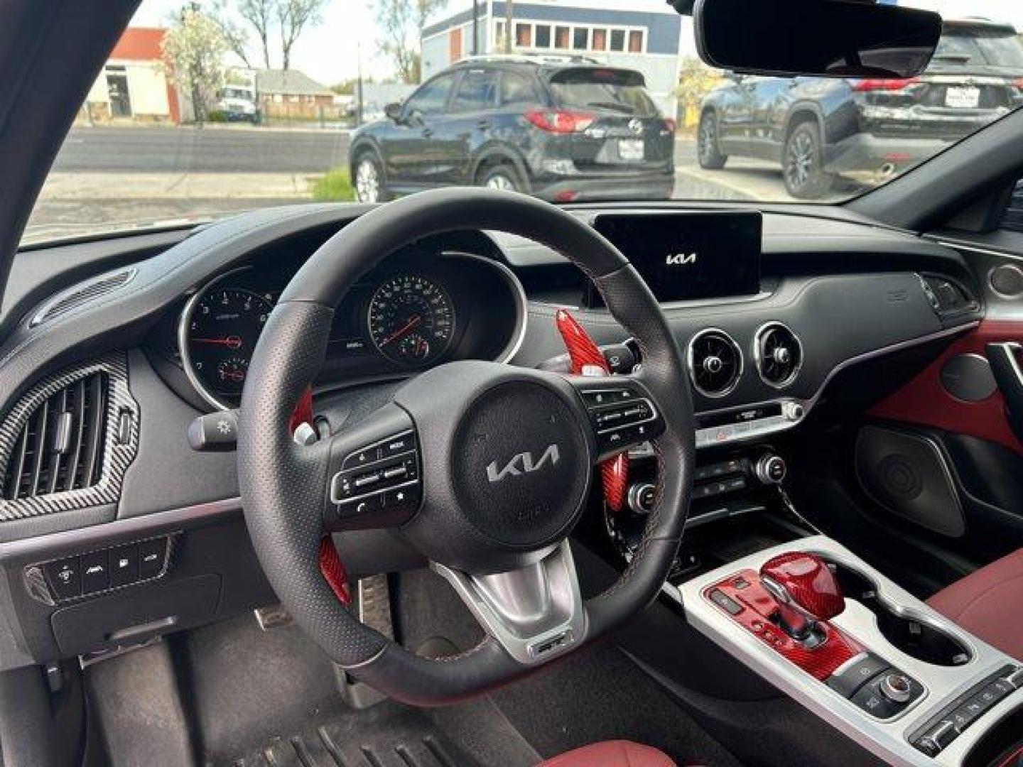 2023 Ceramic Silver /Black Kia Stinger (KNAE55LC8P6) with an 6 3.3 L engine, Automatic transmission, located at 3240 Washington Blvd., Ogden, 84401, (801) 621-7177, 41.204967, -111.969994 - *2023 Kia Stinger GT2*Black out package. Ceramic gray with red leather interior. Every option available. Custom Spoiler. Ceramic/heat blocking window tint.Sherm's Store is a family owned and operated independent auto dealer that has become a household name serving Utah for over 50 years! We speciali - Photo#10