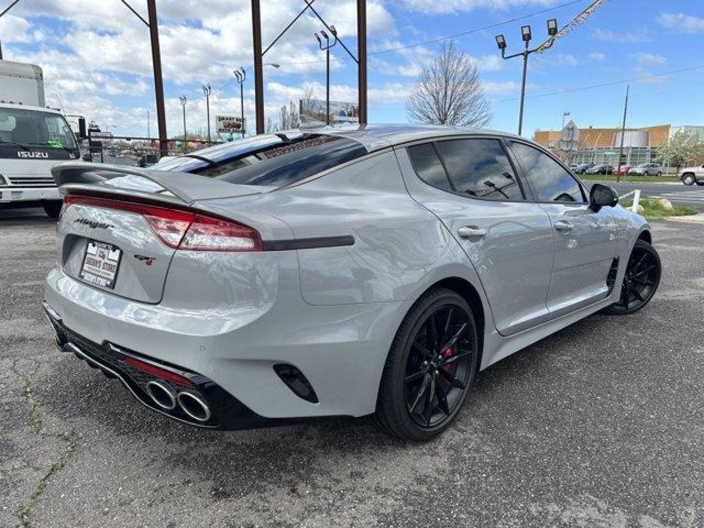 2023 Ceramic Silver /Black Kia Stinger (KNAE55LC8P6) with an 6 3.3 L engine, Automatic transmission, located at 3240 Washington Blvd., Ogden, 84401, (801) 621-7177, 41.204967, -111.969994 - *2023 Kia Stinger GT2*Black out package. Ceramic gray with red leather interior. Every option available. Custom Spoiler. Ceramic/heat blocking window tint.Sherm's Store is a family owned and operated independent auto dealer that has become a household name serving Utah for over 50 years! We speciali - Photo#4