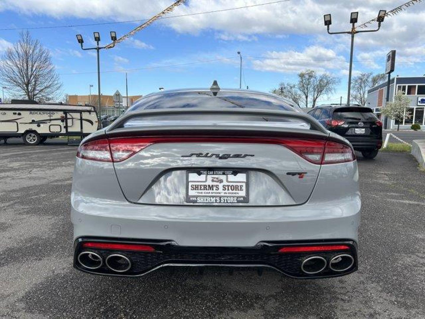 2023 Ceramic Silver /Black Kia Stinger (KNAE55LC8P6) with an 6 3.3 L engine, Automatic transmission, located at 3240 Washington Blvd., Ogden, 84401, (801) 621-7177, 41.204967, -111.969994 - *2023 Kia Stinger GT2*Black out package. Ceramic gray with red leather interior. Every option available. Custom Spoiler. Ceramic/heat blocking window tint.Sherm's Store is a family owned and operated independent auto dealer that has become a household name serving Utah for over 50 years! We speciali - Photo#5