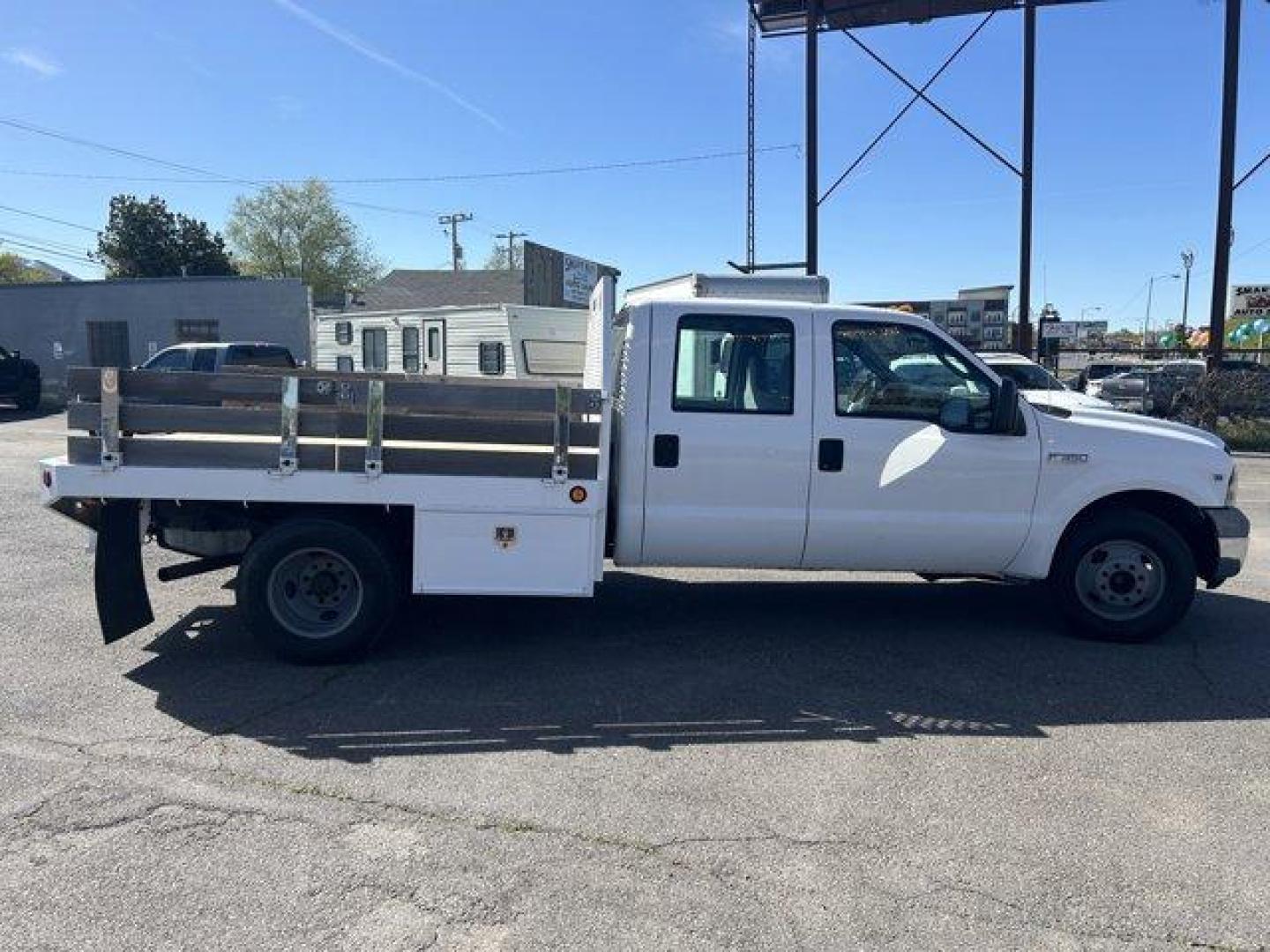 2005 Ford Super Duty F-350 DRW (1FDWW36Y85E) with an 10 6.8L engine, located at 3240 Washington Blvd., Ogden, 84401, (801) 621-7177, 41.204967, -111.969994 - *2005 Ford Super Duty F-350 DRW Crew Cab 176 WB 60 CA XL*6.8-liter v10 gas engine. Drop side flatbed with dual-locking toolboxes, gooseneck ball under steel plate in bed, and 2-inch receiver. Brand-new wood deck with 8 tie down hooks.Sherm's Store is a family owned and operated independent auto deal - Photo#3