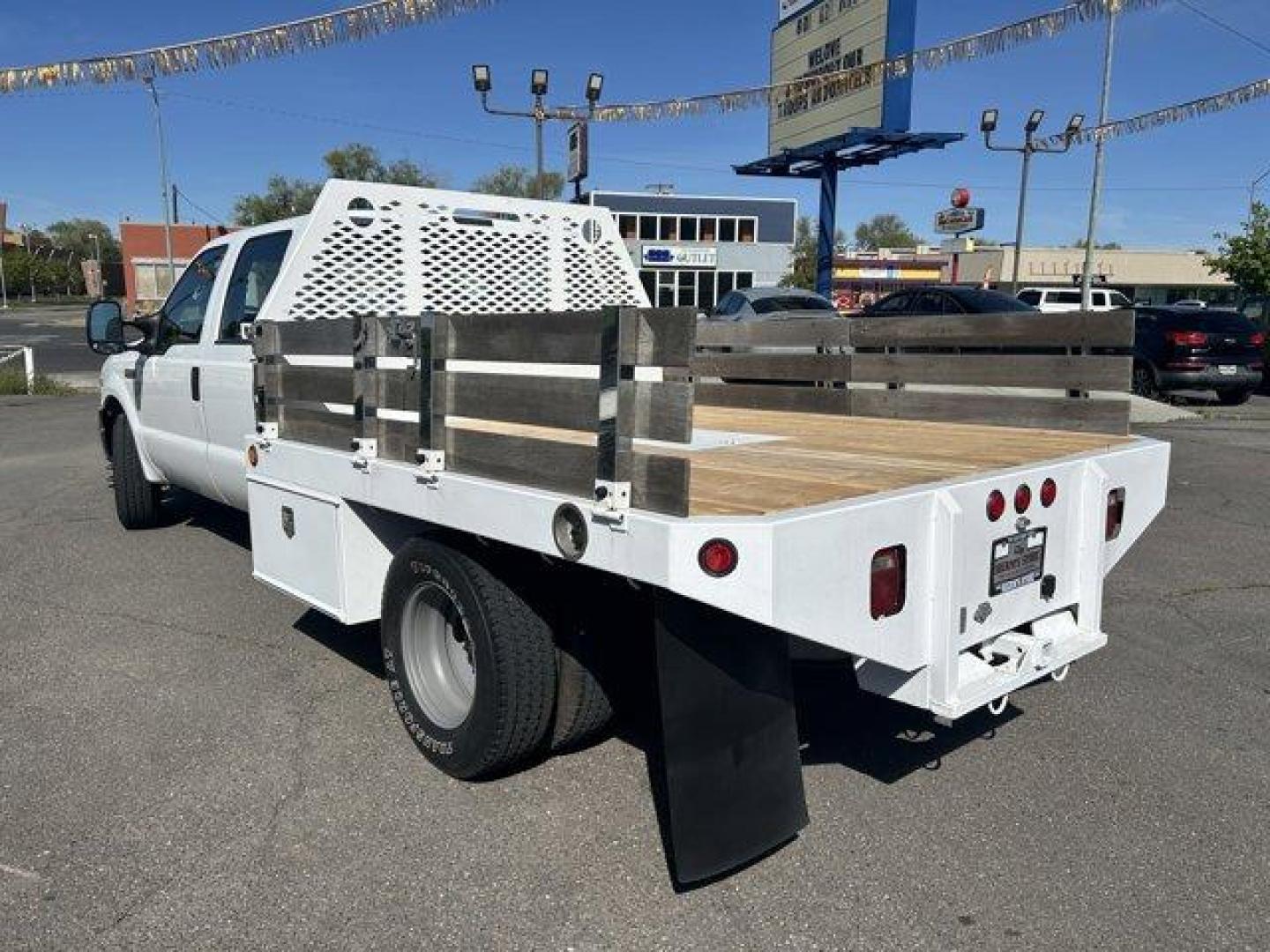 2005 Ford Super Duty F-350 DRW (1FDWW36Y85E) with an 10 6.8L engine, located at 3240 Washington Blvd., Ogden, 84401, (801) 621-7177, 41.204967, -111.969994 - *2005 Ford Super Duty F-350 DRW Crew Cab 176 WB 60 CA XL*6.8-liter v10 gas engine. Drop side flatbed with dual-locking toolboxes, gooseneck ball under steel plate in bed, and 2-inch receiver. Brand-new wood deck with 8 tie down hooks.Sherm's Store is a family owned and operated independent auto deal - Photo#6