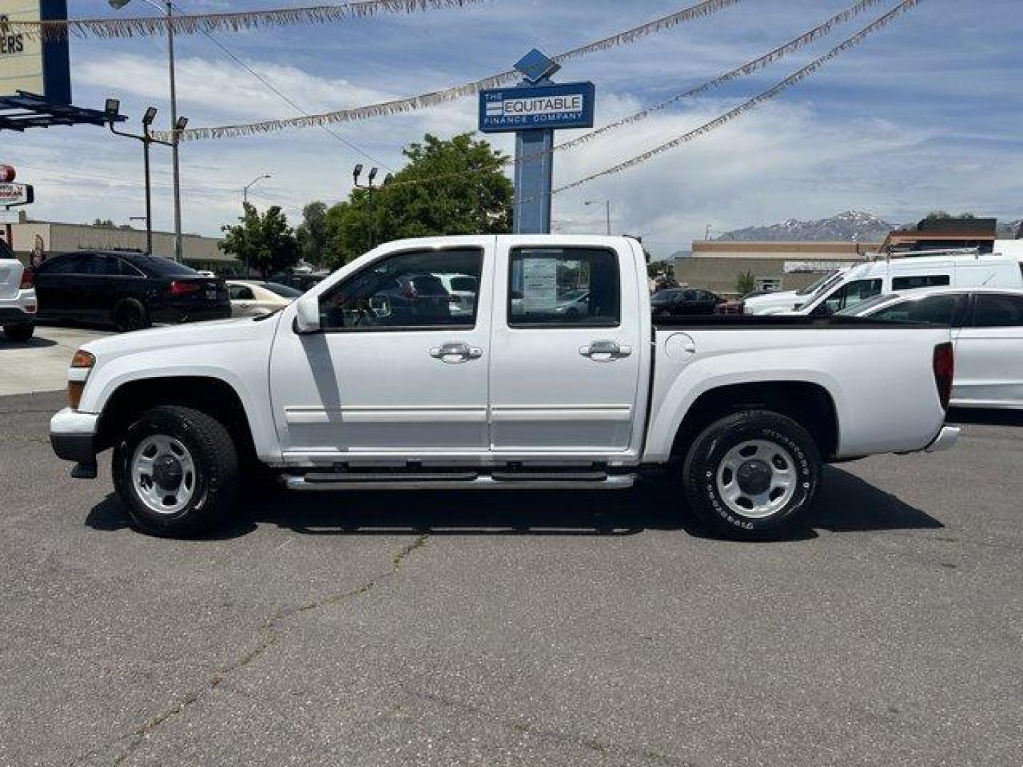 2012 Summit White /Ebony Chevrolet Colorado (1GCHTCFE7C8) with an 5 3.7L engine, Automatic transmission, located at 3240 Washington Blvd., Ogden, 84401, (801) 621-7177, 41.204967, -111.969994 - Photo#7