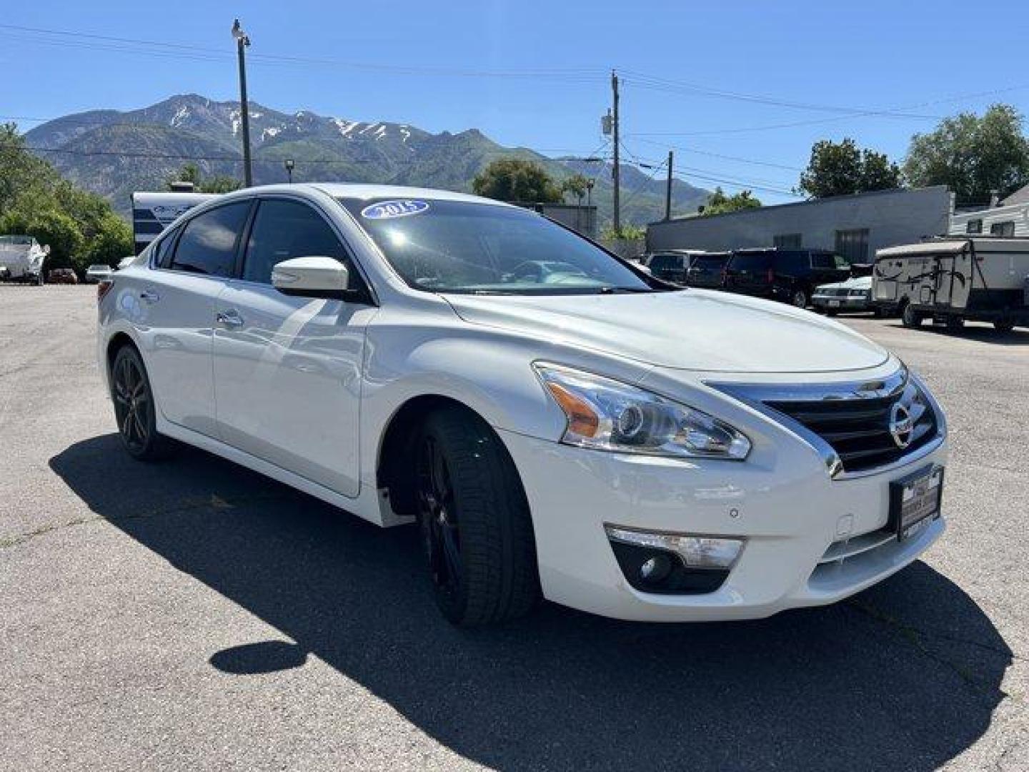 2015 Pearl White /Charcoal Nissan Altima (1N4BL3AP1FC) with an 6 3.5 L engine, Variable transmission, located at 3240 Washington Blvd., Ogden, 84401, (801) 621-7177, 41.204967, -111.969994 - *2015 Nissan Altima 4dr Sdn V6 3.5*Sherm's Store is a family owned and operated independent auto dealer that has become a household name serving Utah for over 50 years! We specialize in excellent condition, pre-owned vehicles. Here at Sherm's, we never mark up interest rates! This means that what yo - Photo#2