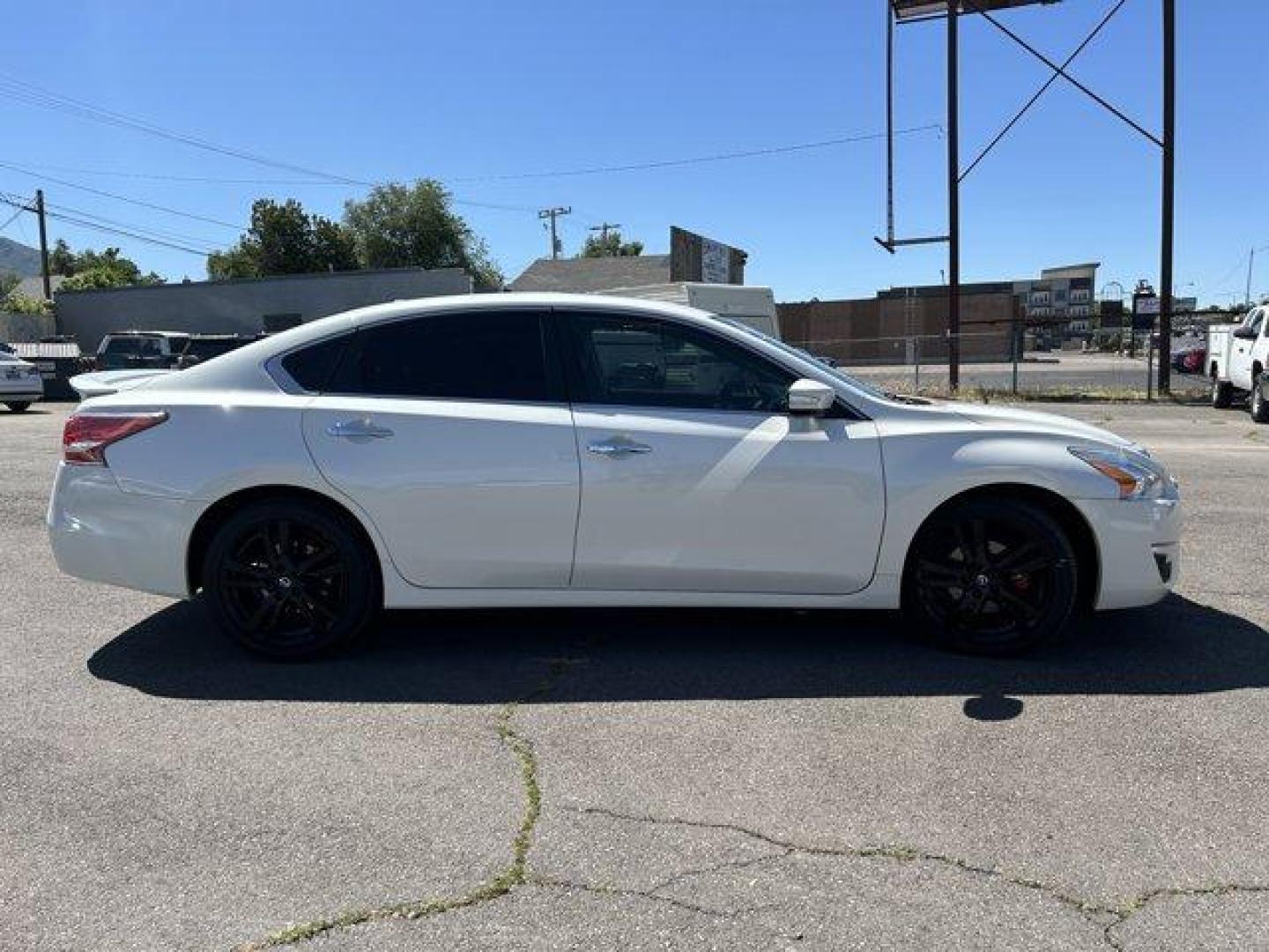 2015 Pearl White /Charcoal Nissan Altima (1N4BL3AP1FC) with an 6 3.5 L engine, Variable transmission, located at 3240 Washington Blvd., Ogden, 84401, (801) 621-7177, 41.204967, -111.969994 - *2015 Nissan Altima 4dr Sdn V6 3.5*Sherm's Store is a family owned and operated independent auto dealer that has become a household name serving Utah for over 50 years! We specialize in excellent condition, pre-owned vehicles. Here at Sherm's, we never mark up interest rates! This means that what yo - Photo#3