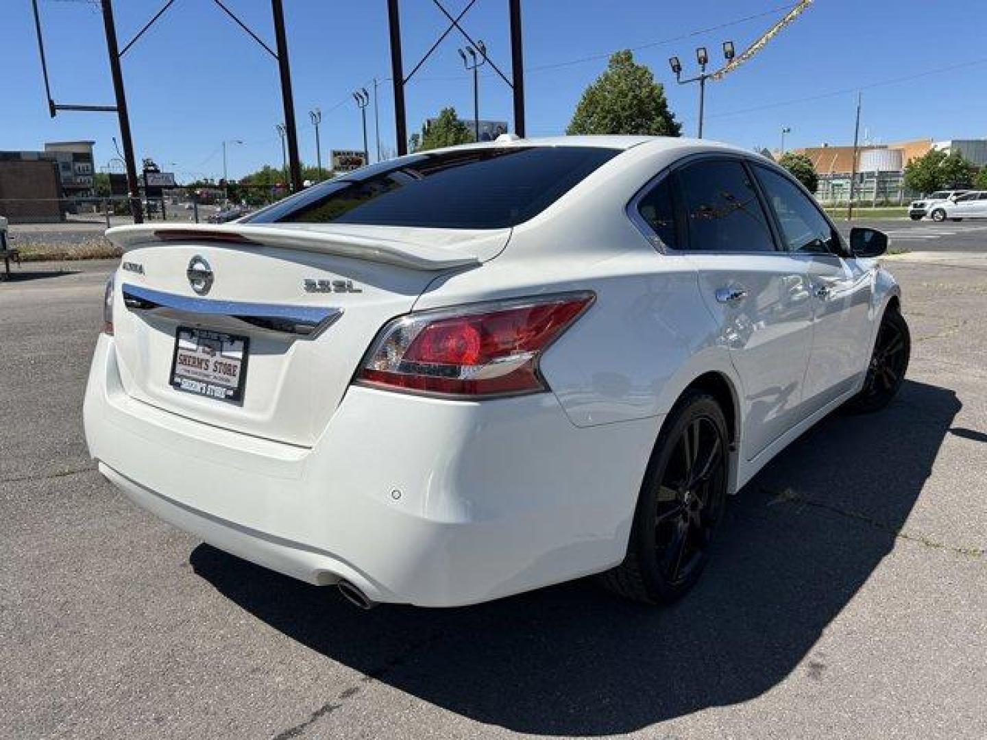 2015 Pearl White /Charcoal Nissan Altima (1N4BL3AP1FC) with an 6 3.5 L engine, Variable transmission, located at 3240 Washington Blvd., Ogden, 84401, (801) 621-7177, 41.204967, -111.969994 - *2015 Nissan Altima 4dr Sdn V6 3.5*Sherm's Store is a family owned and operated independent auto dealer that has become a household name serving Utah for over 50 years! We specialize in excellent condition, pre-owned vehicles. Here at Sherm's, we never mark up interest rates! This means that what yo - Photo#4