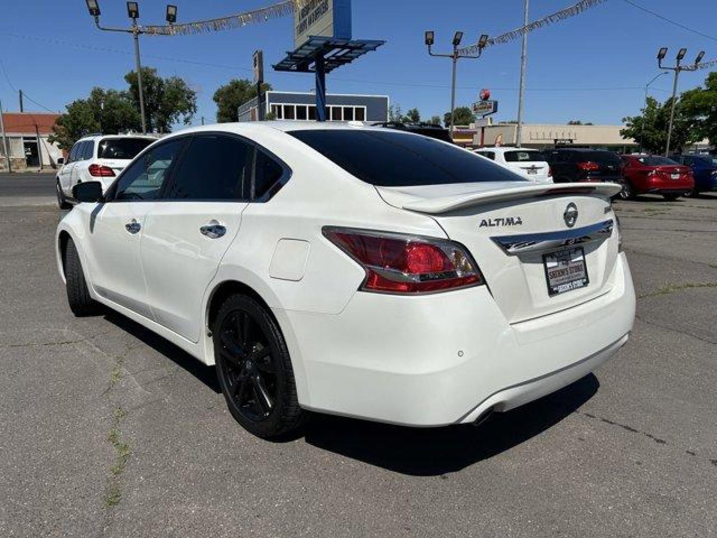 2015 Pearl White /Charcoal Nissan Altima (1N4BL3AP1FC) with an 6 3.5 L engine, Variable transmission, located at 3240 Washington Blvd., Ogden, 84401, (801) 621-7177, 41.204967, -111.969994 - *2015 Nissan Altima 4dr Sdn V6 3.5*Sherm's Store is a family owned and operated independent auto dealer that has become a household name serving Utah for over 50 years! We specialize in excellent condition, pre-owned vehicles. Here at Sherm's, we never mark up interest rates! This means that what yo - Photo#6