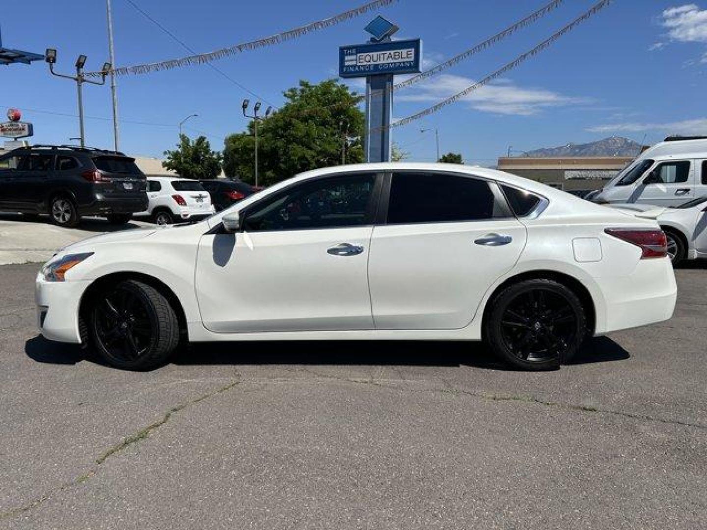 2015 Pearl White /Charcoal Nissan Altima (1N4BL3AP1FC) with an 6 3.5 L engine, Variable transmission, located at 3240 Washington Blvd., Ogden, 84401, (801) 621-7177, 41.204967, -111.969994 - *2015 Nissan Altima 4dr Sdn V6 3.5*Sherm's Store is a family owned and operated independent auto dealer that has become a household name serving Utah for over 50 years! We specialize in excellent condition, pre-owned vehicles. Here at Sherm's, we never mark up interest rates! This means that what yo - Photo#7