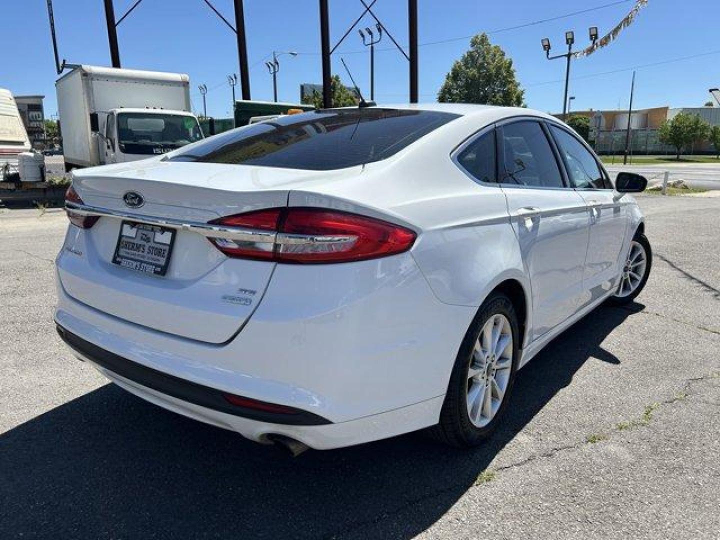 2017 Ford Fusion (3FA6P0HD4HR) with an 4 1.5 L engine, Automatic transmission, located at 3240 Washington Blvd., Ogden, 84401, (801) 621-7177, 41.204967, -111.969994 - *2012 Ford Fusion SE FWD*Sherm's Store is a family owned and operated independent auto dealer that has become a household name serving Utah for over 50 years! We specialize in excellent condition, pre-owned vehicles. Here at Sherm's, we never mark up interest rates! This means that what you qualify - Photo#4