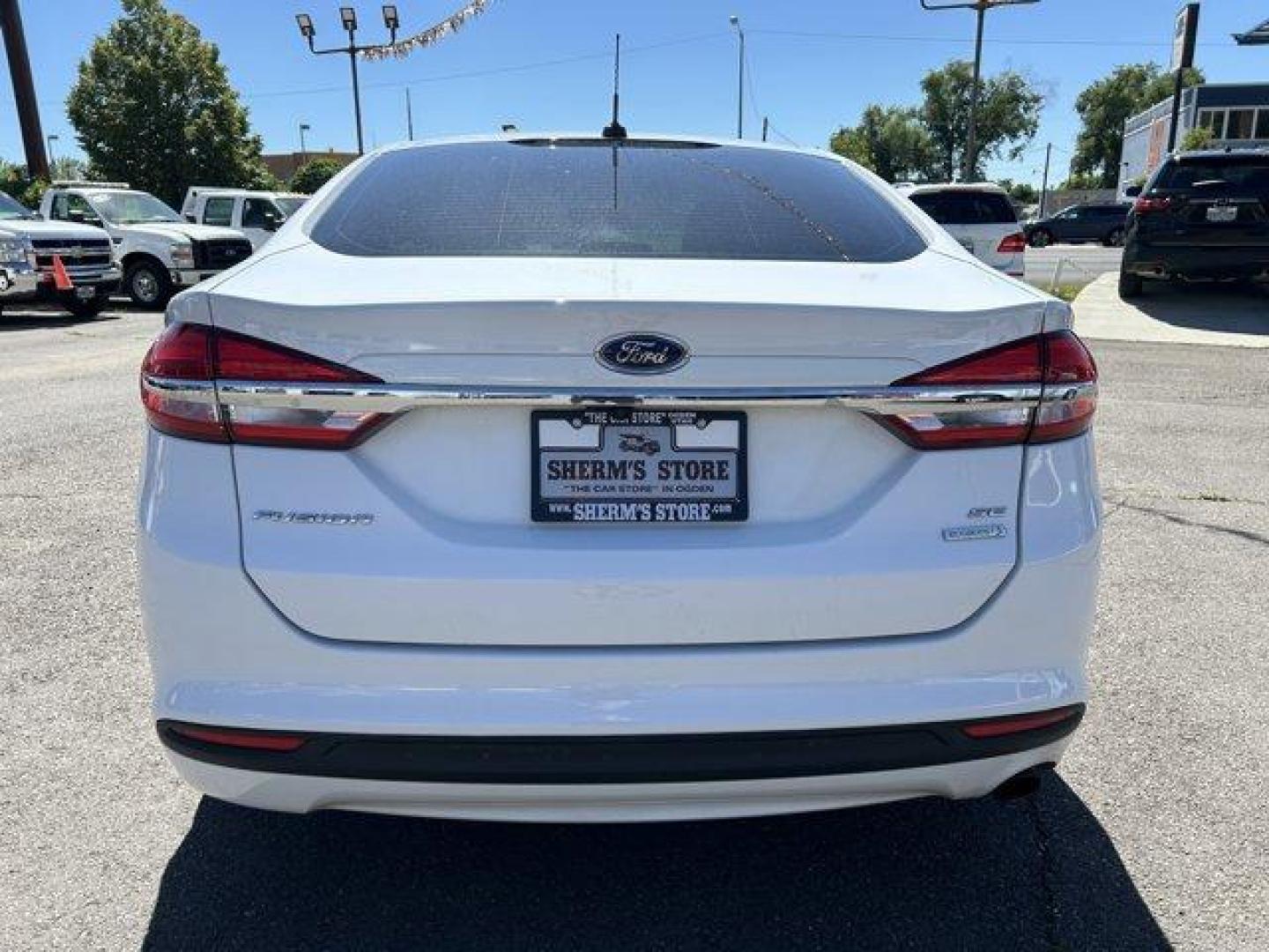 2017 Ford Fusion (3FA6P0HD4HR) with an 4 1.5 L engine, Automatic transmission, located at 3240 Washington Blvd., Ogden, 84401, (801) 621-7177, 41.204967, -111.969994 - *2012 Ford Fusion SE FWD*Sherm's Store is a family owned and operated independent auto dealer that has become a household name serving Utah for over 50 years! We specialize in excellent condition, pre-owned vehicles. Here at Sherm's, we never mark up interest rates! This means that what you qualify - Photo#5