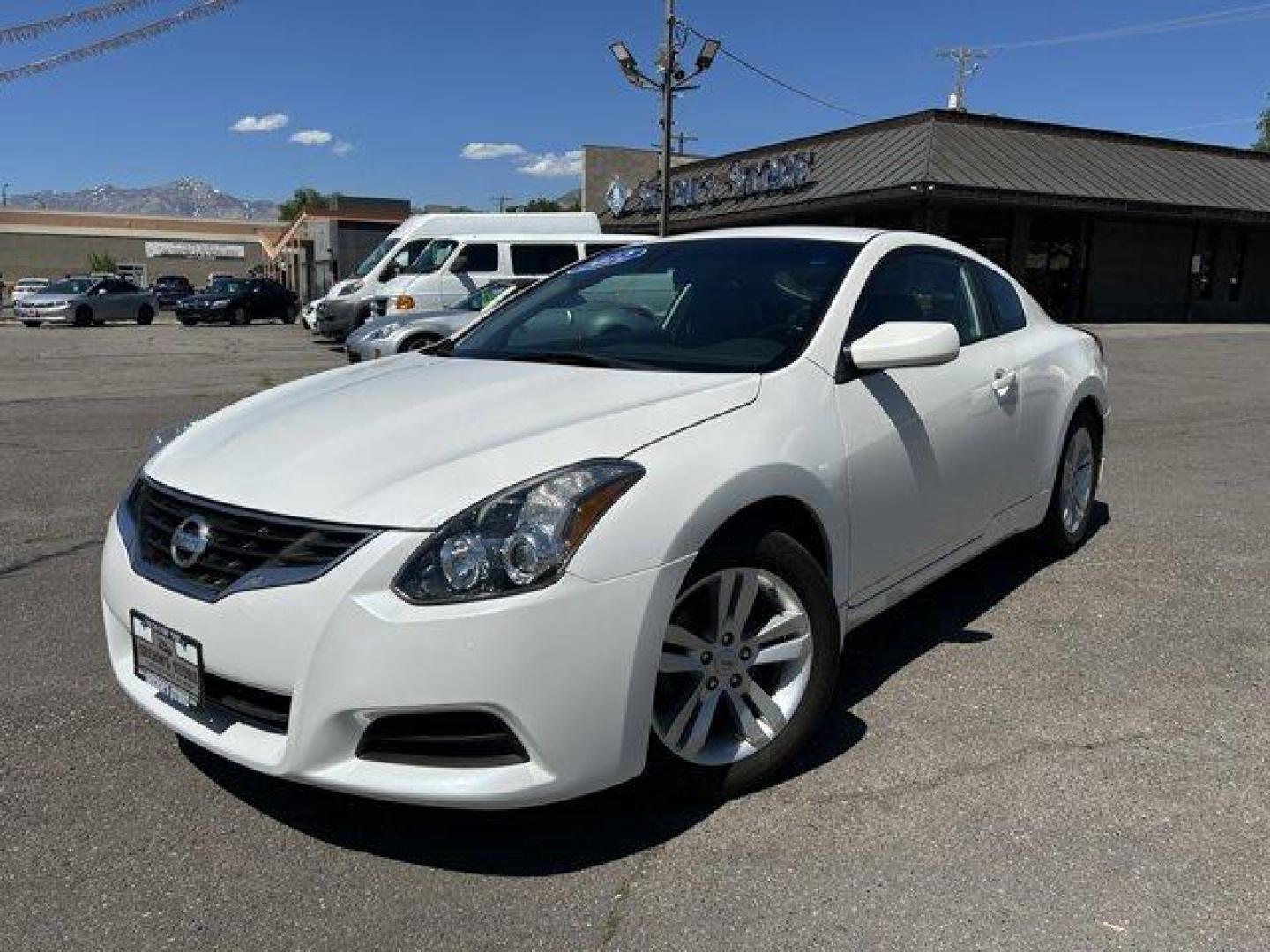 2012 Winter Frost Pearl /Charcoal Nissan Altima (1N4AL2EPXCC) with an 4 2.5L engine, Manual transmission, located at 3240 Washington Blvd., Ogden, 84401, (801) 621-7177, 41.204967, -111.969994 - Photo#0