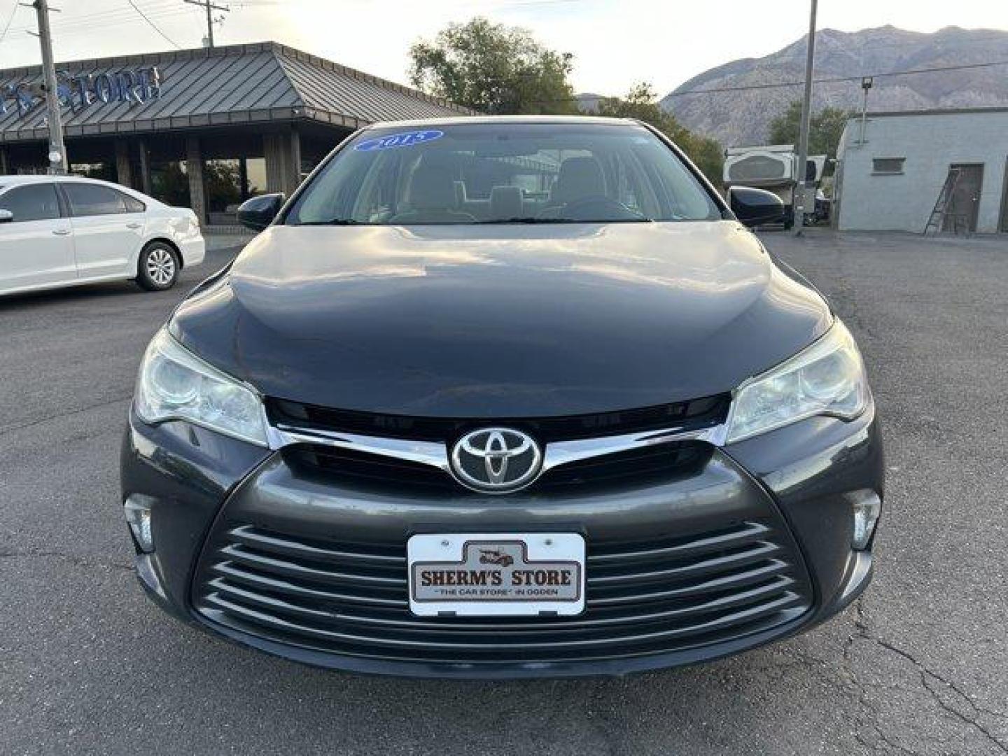 2015 Toyota Camry (4T1BF1FK4FU) with an 4 2.5 L engine, Automatic transmission, located at 3240 Washington Blvd., Ogden, 84401, (801) 621-7177, 41.204967, -111.969994 - *2015 Toyota Camry 4dr Sdn I4 Auto LE*This is a great car! For anyone looking for a good commuter car this is it! It has very low miles (66,831 miles) and is very reliable! Its in excellent condition inside and out! It has a back up camera and aftermarket alloy wheels!!Sherm's Store is a family owne - Photo#1