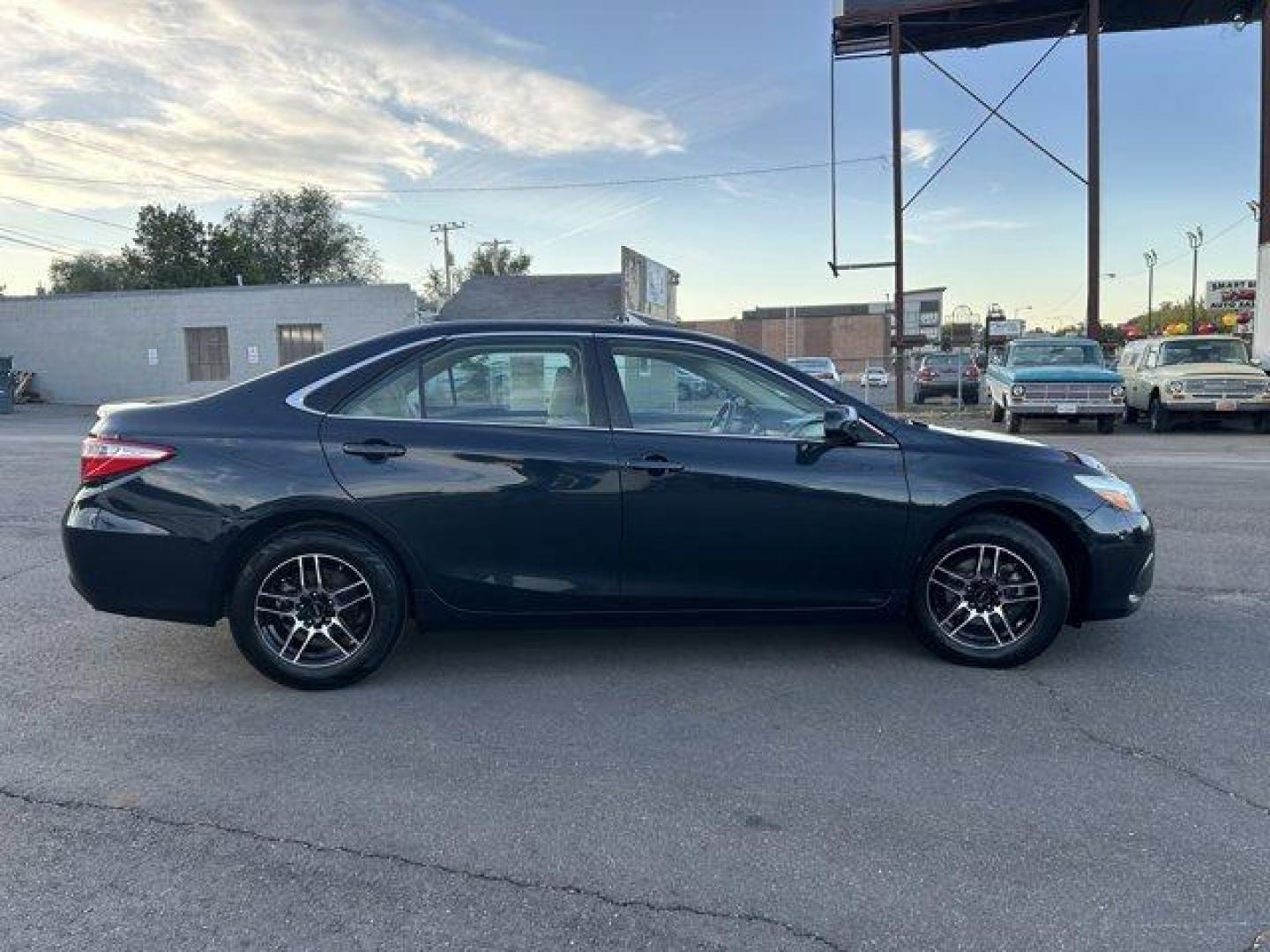 2015 Toyota Camry (4T1BF1FK4FU) with an 4 2.5 L engine, Automatic transmission, located at 3240 Washington Blvd., Ogden, 84401, (801) 621-7177, 41.204967, -111.969994 - *2015 Toyota Camry 4dr Sdn I4 Auto LE*This is a great car! For anyone looking for a good commuter car this is it! It has very low miles (66,831 miles) and is very reliable! Its in excellent condition inside and out! It has a back up camera and aftermarket alloy wheels!!Sherm's Store is a family owne - Photo#3