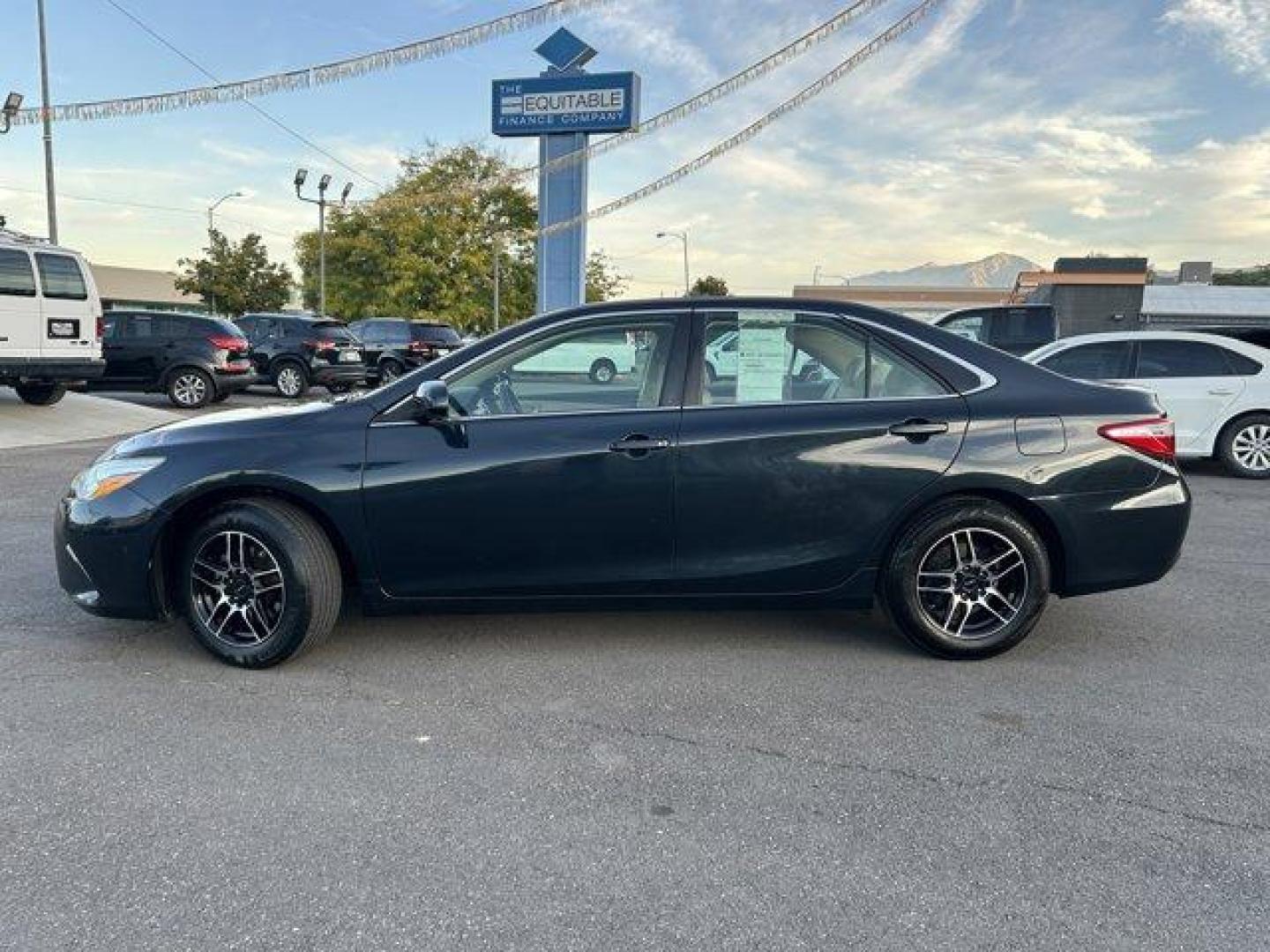 2015 Toyota Camry (4T1BF1FK4FU) with an 4 2.5 L engine, Automatic transmission, located at 3240 Washington Blvd., Ogden, 84401, (801) 621-7177, 41.204967, -111.969994 - *2015 Toyota Camry 4dr Sdn I4 Auto LE*This is a great car! For anyone looking for a good commuter car this is it! It has very low miles (66,831 miles) and is very reliable! Its in excellent condition inside and out! It has a back up camera and aftermarket alloy wheels!!Sherm's Store is a family owne - Photo#7