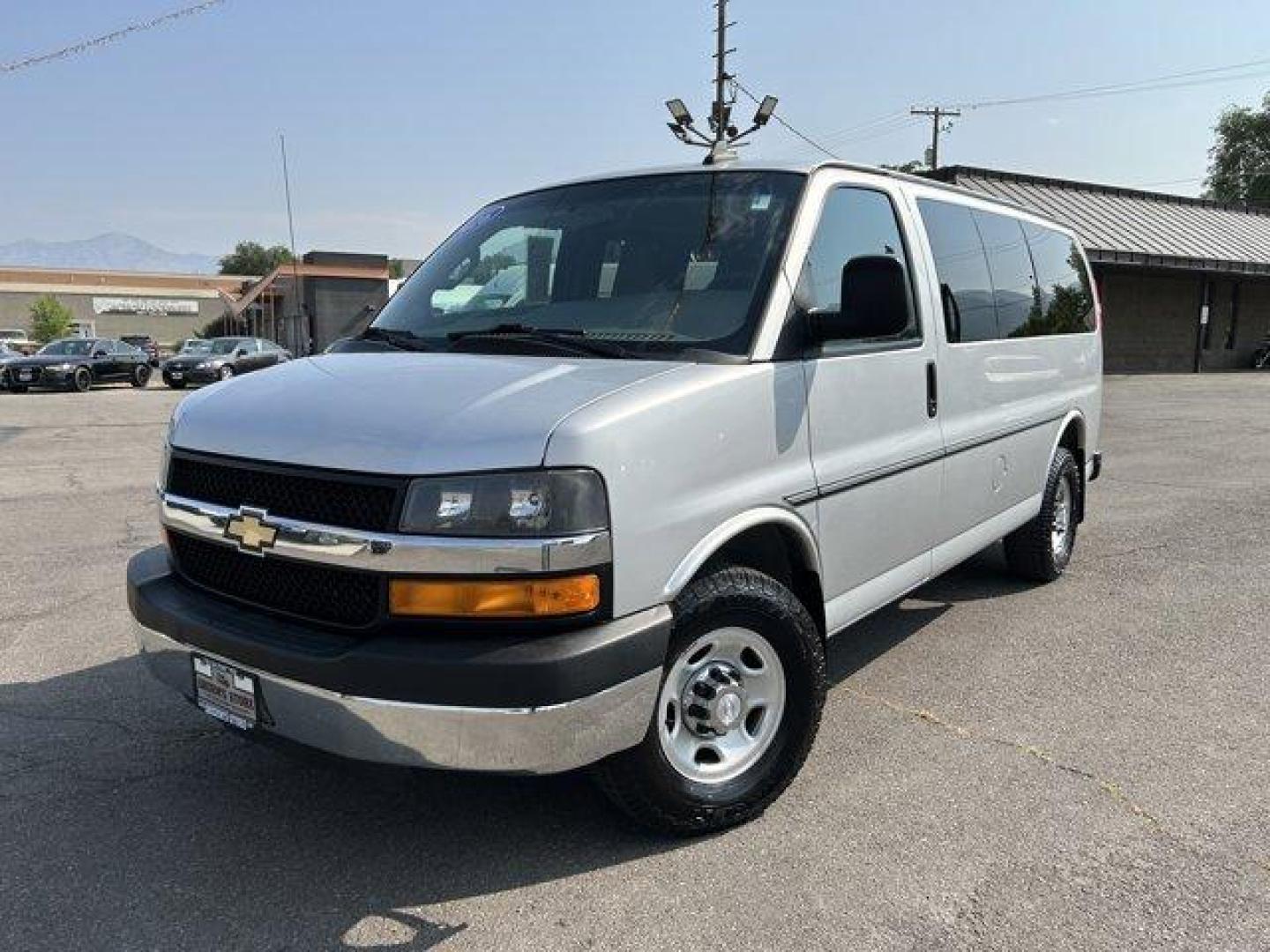 2016 Silver Ice Metallic /Medium Pewter Chevrolet Express Passenger (1GAZGMFG7G1) with an 8 6.0L engine, Automatic transmission, located at 3240 Washington Blvd., Ogden, 84401, (801) 621-7177, 41.204967, -111.969994 - *2016 Chevrolet Express Passenger RWD 3500 135 LT w/1LT*Sherm's Store is a family owned and operated independent auto dealer that has become a household name serving Utah for over 50 years! We specialize in excellent condition, pre-owned vehicles. Here at Sherm's, we never mark up interest rates! Th - Photo#0