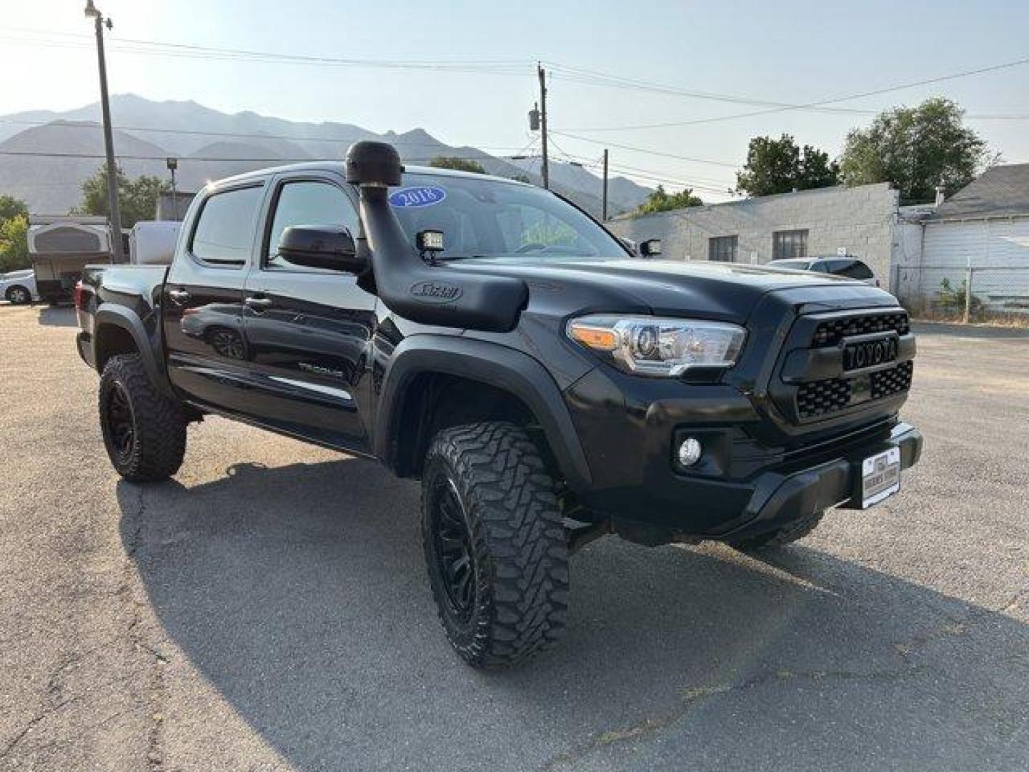 2018 Toyota Tacoma (3TMCZ5AN1JM) with an 6 3.5 L engine, Automatic transmission, located at 3240 Washington Blvd., Ogden, 84401, (801) 621-7177, 41.204967, -111.969994 - *2018 Toyota Tacoma TRD Off Road Double Cab 5' Bed V6 4x4 AT*Sherm's Store is a family owned and operated independent auto dealer that has become a household name serving Utah for over 50 years! We specialize in excellent condition, pre-owned vehicles. Here at Sherm's, we never mark up interest rate - Photo#2