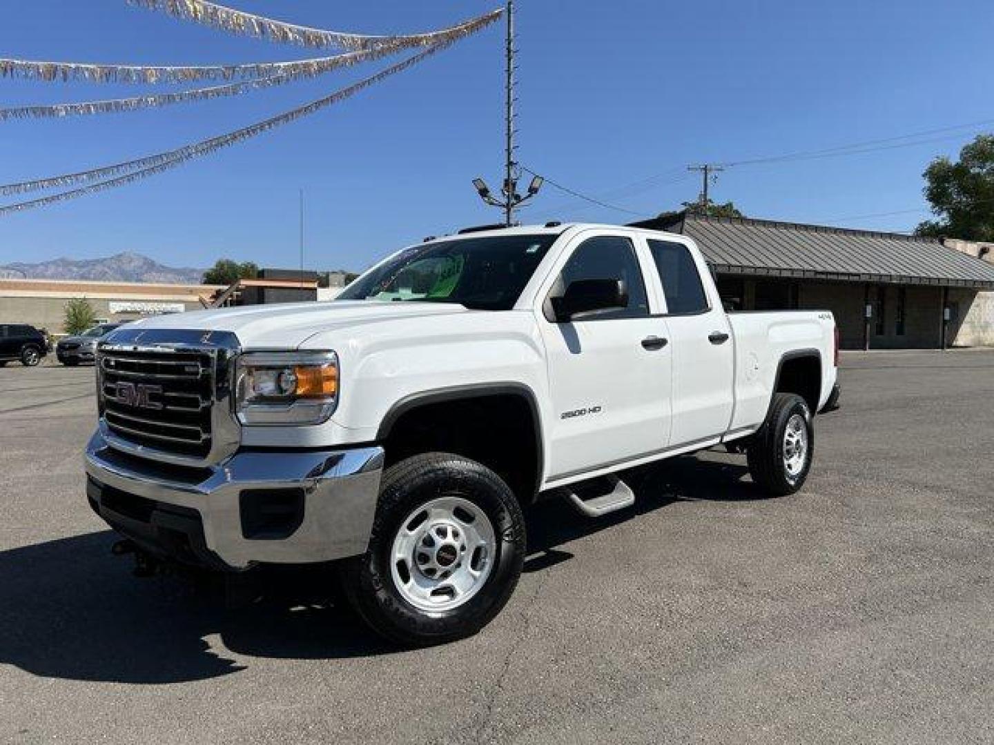 2015 Summit White /Jet Black/Dark Ash GMC Sierra 2500HD (1GT22XEG3FZ) with an 8 6.0L engine, Automatic transmission, located at 3240 Washington Blvd., Ogden, 84401, (801) 621-7177, 41.204967, -111.969994 - *2015 GMC Sierra 2500HD*This is an awesome work truck! Very low milage! Has 4-wheel drive and a bed rack! It also has the hook ups for a snowplow! Great for the winter season coming up!!Sherm's Store is a family owned and operated independent auto dealer that has become a household name serving Utah - Photo#0