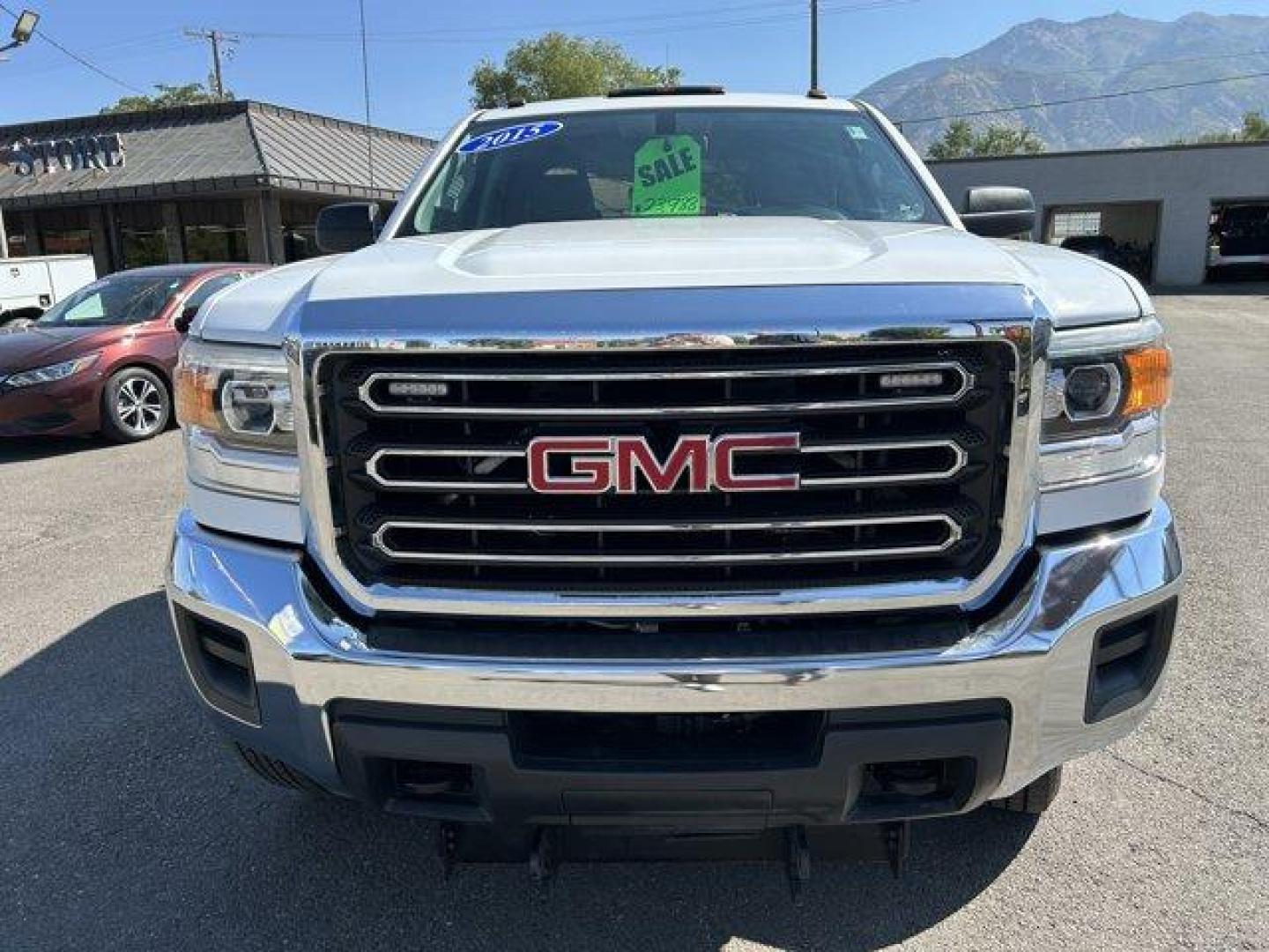 2015 Summit White /Jet Black/Dark Ash GMC Sierra 2500HD (1GT22XEG3FZ) with an 8 6.0L engine, Automatic transmission, located at 3240 Washington Blvd., Ogden, 84401, (801) 621-7177, 41.204967, -111.969994 - *2015 GMC Sierra 2500HD*This is an awesome work truck! Very low milage! Has 4-wheel drive and a bed rack! It also has the hook ups for a snowplow! Great for the winter season coming up!!Sherm's Store is a family owned and operated independent auto dealer that has become a household name serving Utah - Photo#1