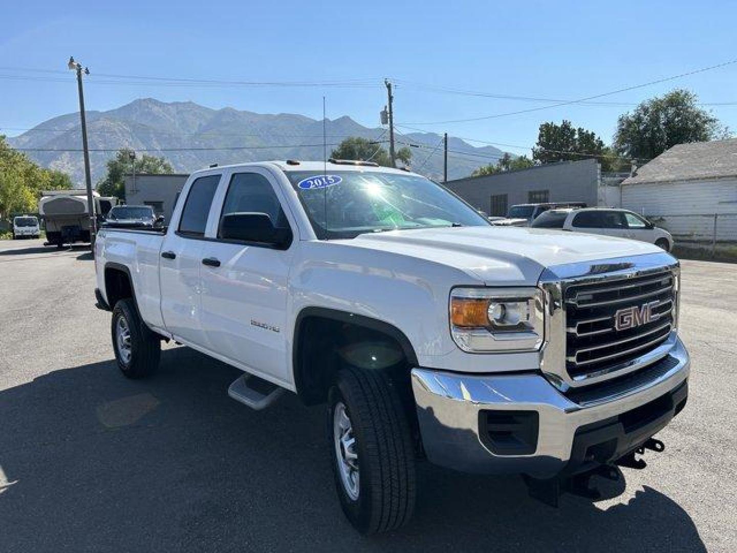 2015 Summit White /Jet Black/Dark Ash GMC Sierra 2500HD (1GT22XEG3FZ) with an 8 6.0L engine, Automatic transmission, located at 3240 Washington Blvd., Ogden, 84401, (801) 621-7177, 41.204967, -111.969994 - *2015 GMC Sierra 2500HD*This is an awesome work truck! Very low milage! Has 4-wheel drive and a bed rack! It also has the hook ups for a snowplow! Great for the winter season coming up!!Sherm's Store is a family owned and operated independent auto dealer that has become a household name serving Utah - Photo#2