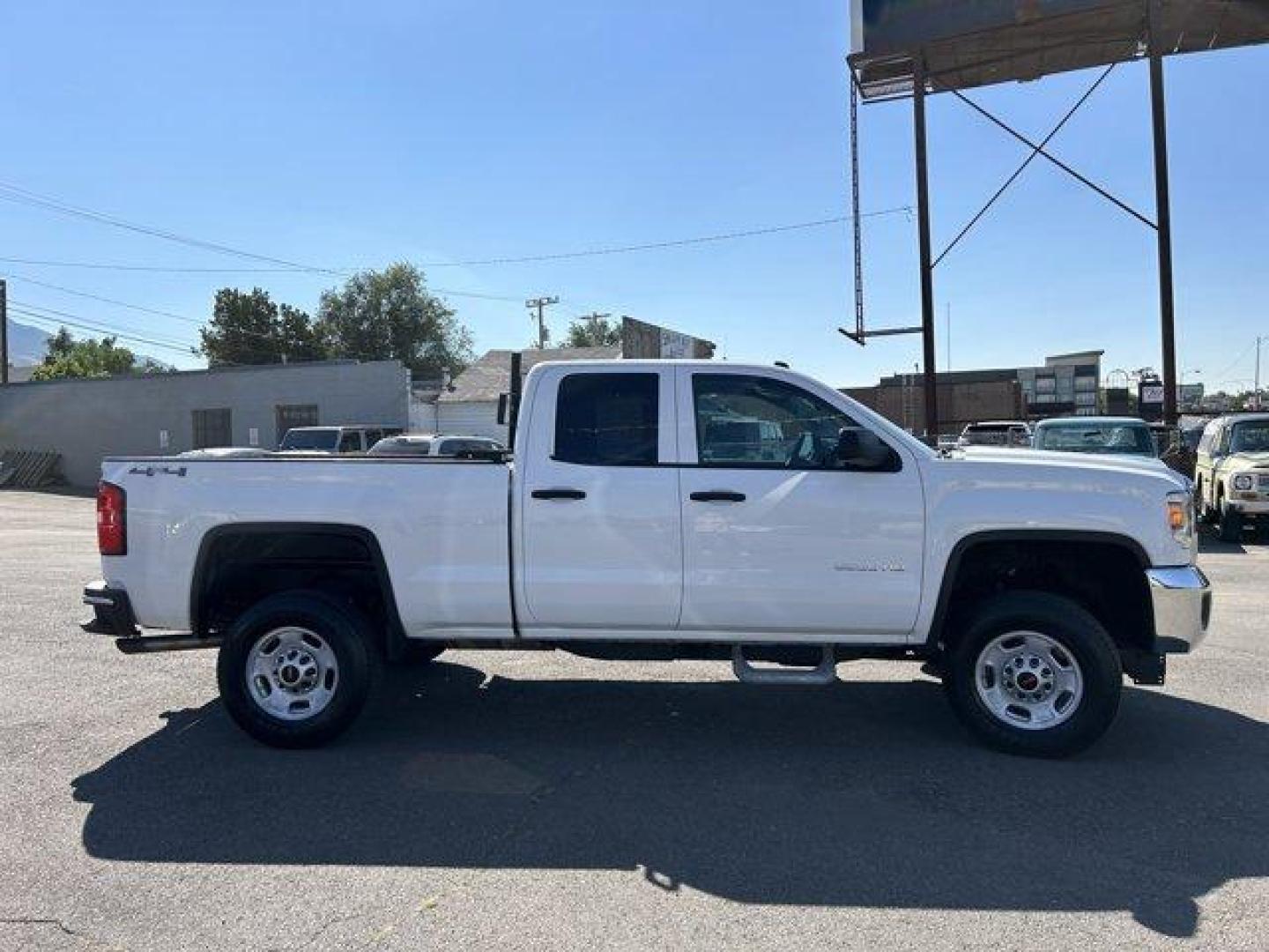 2015 Summit White /Jet Black/Dark Ash GMC Sierra 2500HD (1GT22XEG3FZ) with an 8 6.0L engine, Automatic transmission, located at 3240 Washington Blvd., Ogden, 84401, (801) 621-7177, 41.204967, -111.969994 - *2015 GMC Sierra 2500HD*This is an awesome work truck! Very low milage! Has 4-wheel drive and a bed rack! It also has the hook ups for a snowplow! Great for the winter season coming up!!Sherm's Store is a family owned and operated independent auto dealer that has become a household name serving Utah - Photo#3