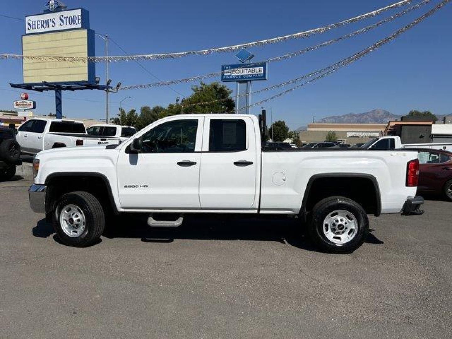 2015 Summit White /Jet Black/Dark Ash GMC Sierra 2500HD (1GT22XEG3FZ) with an 8 6.0L engine, Automatic transmission, located at 3240 Washington Blvd., Ogden, 84401, (801) 621-7177, 41.204967, -111.969994 - *2015 GMC Sierra 2500HD*This is an awesome work truck! Very low milage! Has 4-wheel drive and a bed rack! It also has the hook ups for a snowplow! Great for the winter season coming up!!Sherm's Store is a family owned and operated independent auto dealer that has become a household name serving Utah - Photo#7