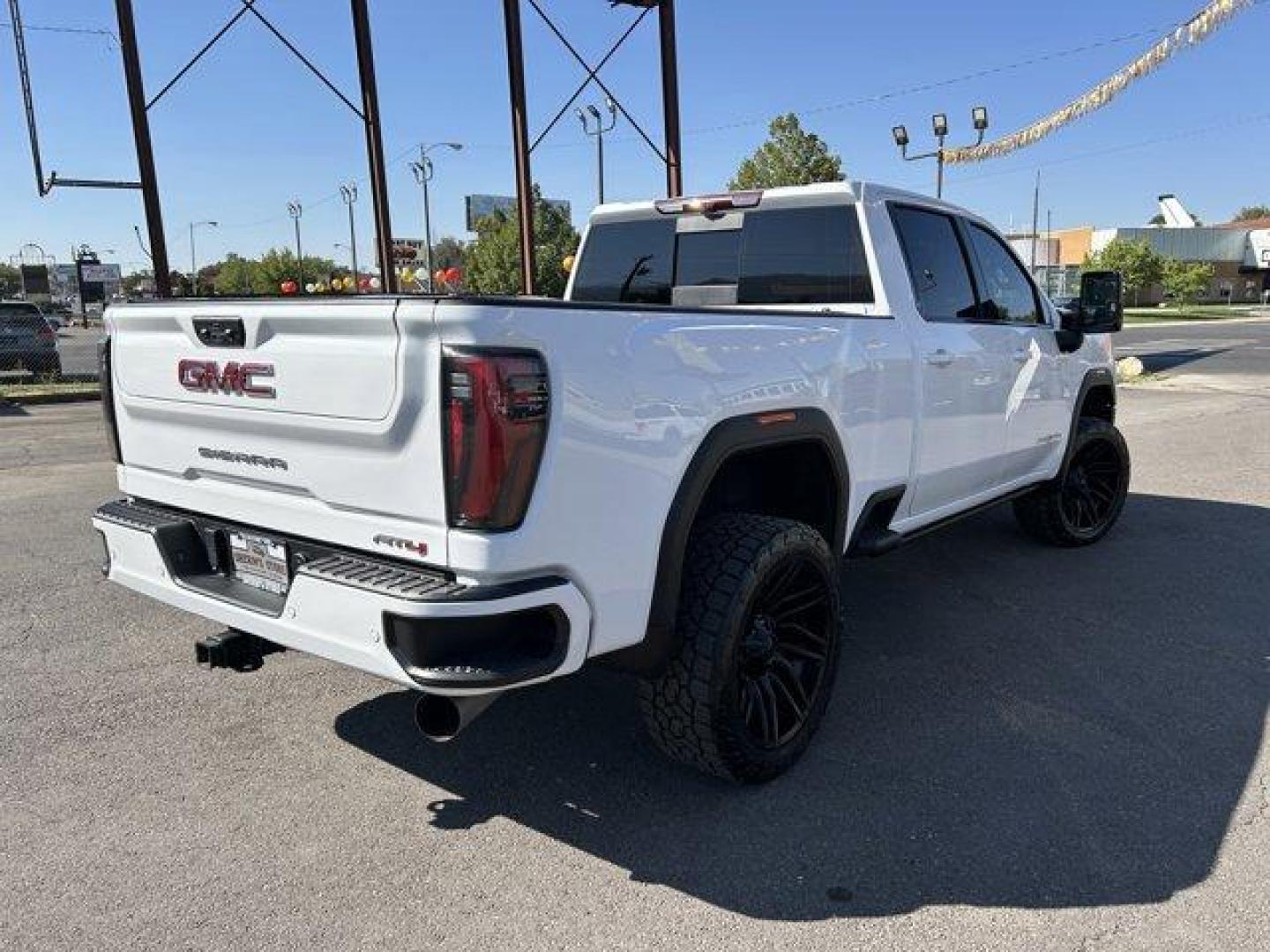 2024 Summit White /Jet Black with Kalahari accents GMC Sierra 3500HD (1GT49VEY8RF) with an 8 6.6L engine, Automatic transmission, located at 3240 Washington Blvd., Ogden, 84401, (801) 621-7177, 41.204967, -111.969994 - *2024 GMC Sierra 3500HD AT4*Loaded! Two-tone leather (heated and cooled) power seats, sunroof, power running boards, remote start, multi-function tailgate, 360 backup camera, Rev Industries hard folding bed cover, heads-up display, wireless phone charger, 22 Fuel wheels with Toyo Open Country A/T II - Photo#4