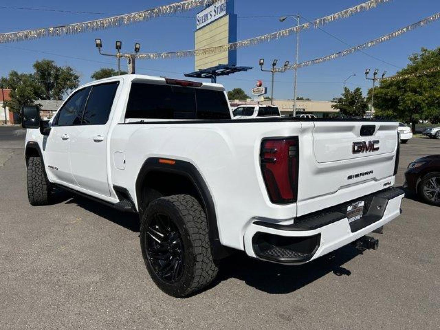 2024 Summit White /Jet Black with Kalahari accents GMC Sierra 3500HD (1GT49VEY8RF) with an 8 6.6L engine, Automatic transmission, located at 3240 Washington Blvd., Ogden, 84401, (801) 621-7177, 41.204967, -111.969994 - *2024 GMC Sierra 3500HD AT4*Loaded! Two-tone leather (heated and cooled) power seats, sunroof, power running boards, remote start, multi-function tailgate, 360 backup camera, Rev Industries hard folding bed cover, heads-up display, wireless phone charger, 22 Fuel wheels with Toyo Open Country A/T II - Photo#6