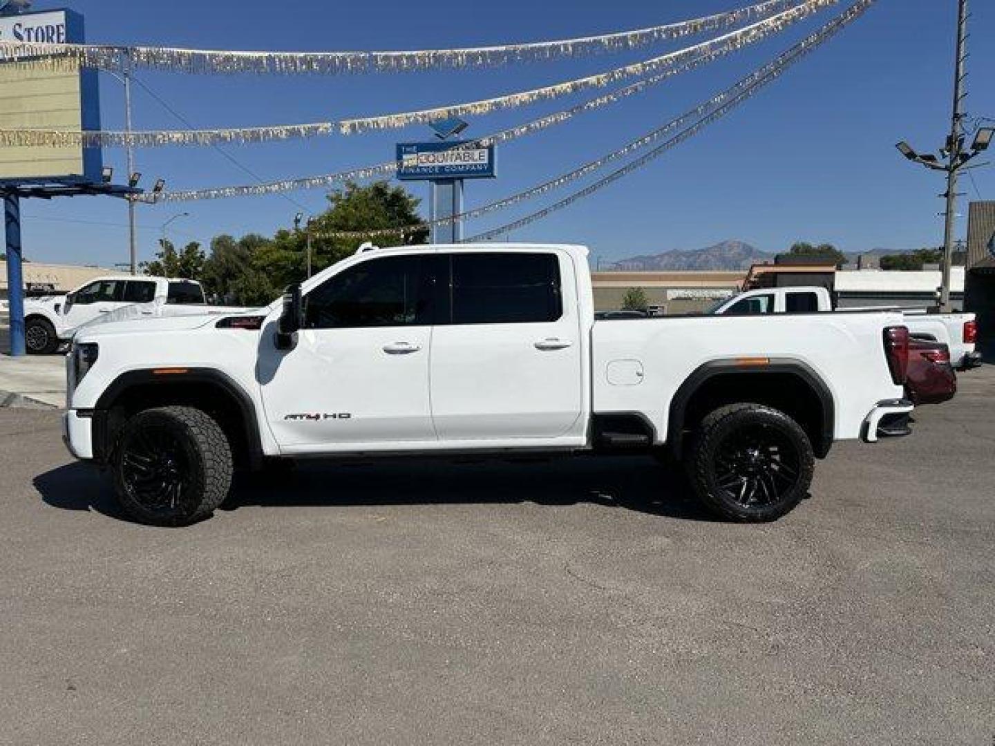 2024 Summit White /Jet Black with Kalahari accents GMC Sierra 3500HD (1GT49VEY8RF) with an 8 6.6L engine, Automatic transmission, located at 3240 Washington Blvd., Ogden, 84401, (801) 621-7177, 41.204967, -111.969994 - *2024 GMC Sierra 3500HD AT4*Loaded! Two-tone leather (heated and cooled) power seats, sunroof, power running boards, remote start, multi-function tailgate, 360 backup camera, Rev Industries hard folding bed cover, heads-up display, wireless phone charger, 22 Fuel wheels with Toyo Open Country A/T II - Photo#7