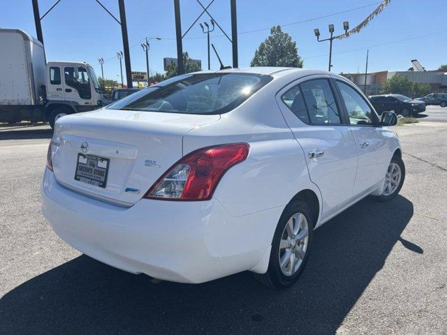 2012 Fresh Powder /Charcoal Nissan Versa (3N1CN7AP9CL) with an 4 1.6L engine, Variable transmission, located at 3240 Washington Blvd., Ogden, 84401, (801) 621-7177, 41.204967, -111.969994 - This is a great car to get you where you need to go. It haslow milagefor less than $10,000!Sherm's Store is a family owned and operated independent auto dealer that has become a household name serving Utah for over 50 years! We specialize in excellent condition, pre-owned vehicles. We focus on each - Photo#4