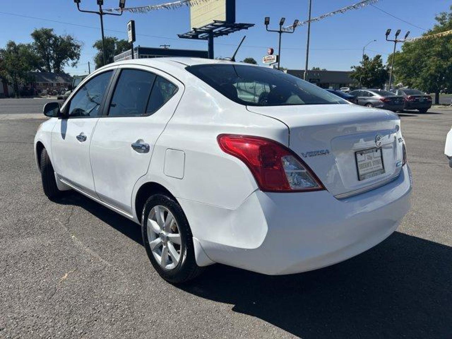 2012 Fresh Powder /Charcoal Nissan Versa (3N1CN7AP9CL) with an 4 1.6L engine, Variable transmission, located at 3240 Washington Blvd., Ogden, 84401, (801) 621-7177, 41.204967, -111.969994 - This is a great car to get you where you need to go. It haslow milagefor less than $10,000!Sherm's Store is a family owned and operated independent auto dealer that has become a household name serving Utah for over 50 years! We specialize in excellent condition, pre-owned vehicles. We focus on each - Photo#6