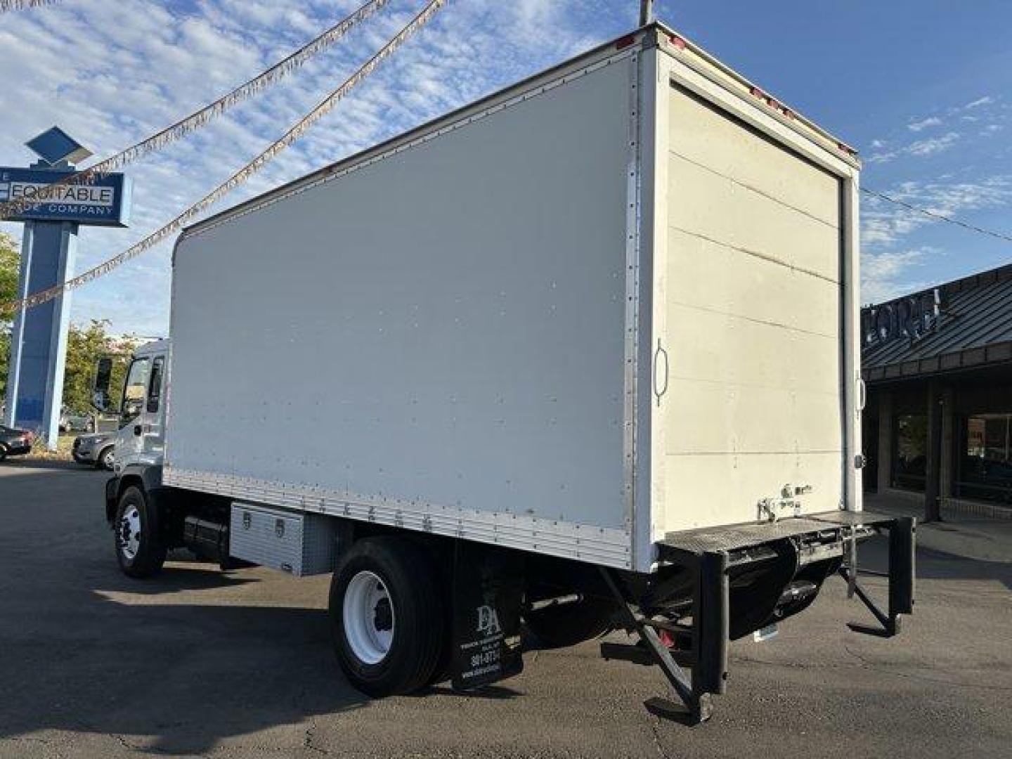 2007 White GMC T7500 (1GDP7F1387F) with an 6 7.8 L engine, Automatic transmission, located at 3240 Washington Blvd., Ogden, 84401, (801) 621-7177, 41.204967, -111.969994 - *2007 GMC Medium Duty T7500*This Box Truck is great for hauling things around! It's 20 feet long, 8 feet wide, and 8 feet tall. It also has a *power liftgate*!It only has one owner and has not had a single accident. It's a 7.8 Liter Isuzu inline-six d engineSherm's Store is a family owned and operat - Photo#5