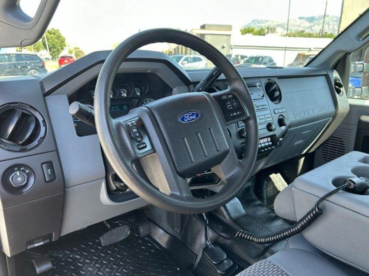 2015 Ford Super Duty F-350 SRW (1FT8W3B69FE) with an 8 6.2L engine, Automatic transmission, located at 3240 Washington Blvd., Ogden, 84401, (801) 621-7177, 41.204967, -111.969994 - *2015 Ford Super Duty F-350 SRW 4WD Plow Truck*This is a great truck! It's in great condition. Has l*ow milage* and a beautiful plow in front.*Crew cab**4 wheel drive*Sherm's Store is a family owned and operated independent auto dealer that has become a household name serving Utah for over 50 years! - Photo#16