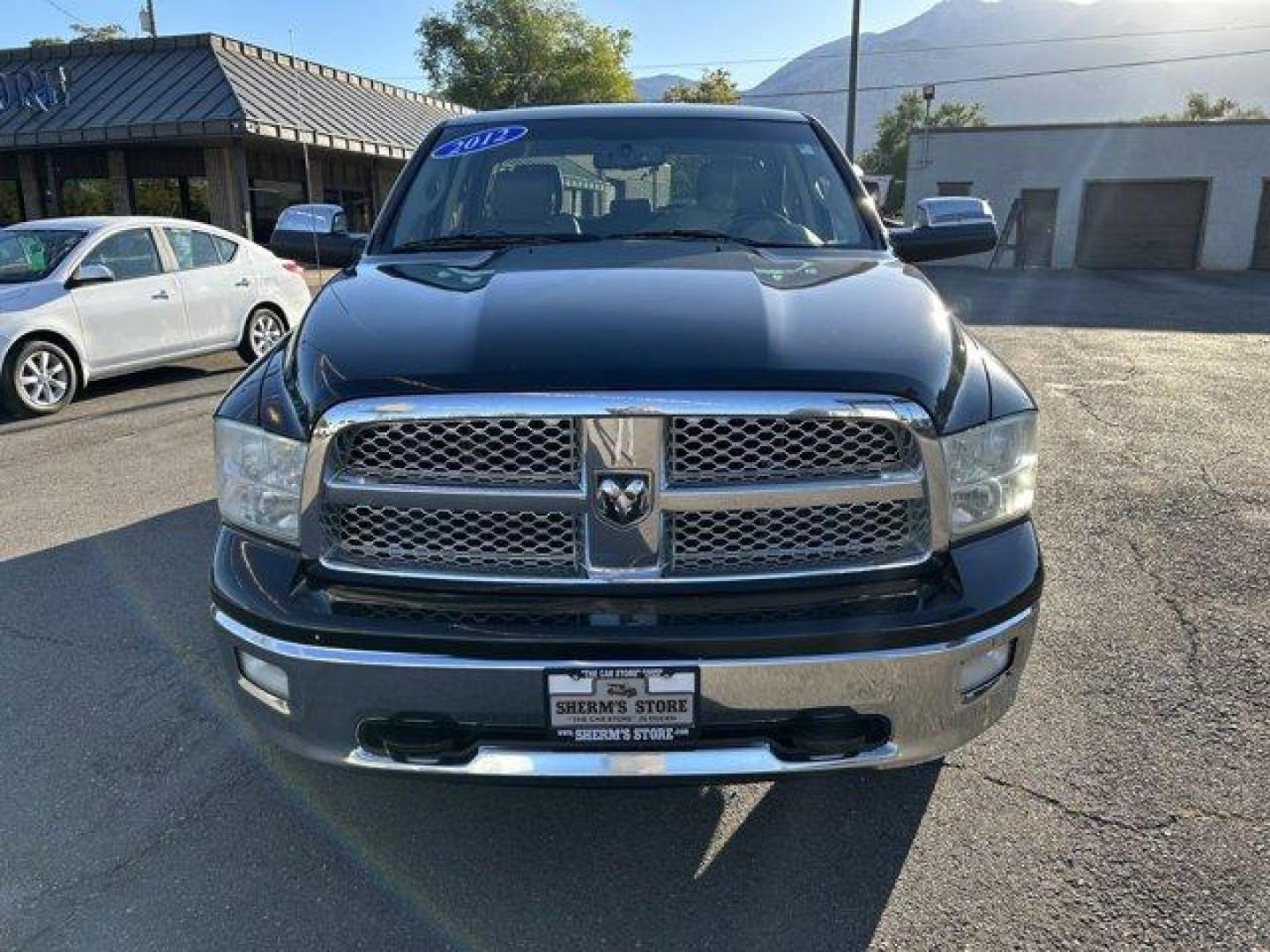 2012 Black/Silver /Tan/Brown Ram 1500 (1C6RD7JT3CS) with an 8 5.7L engine, Automatic transmission, located at 3240 Washington Blvd., Ogden, 84401, (801) 621-7177, 41.204967, -111.969994 - *2012 Ram 1500 Laramie*This is an excellent truck! It drive great! Here's some highlights:Its got a *5.7L Hemi Engine**Flip up tow mirrors **Curt Discovery tow break controller **Brand New* Good Year Wrangler SR-A tires*4 Wheel drive*Black/Silver exteriorBrown/tan interiorSherm's Store is a family o - Photo#1