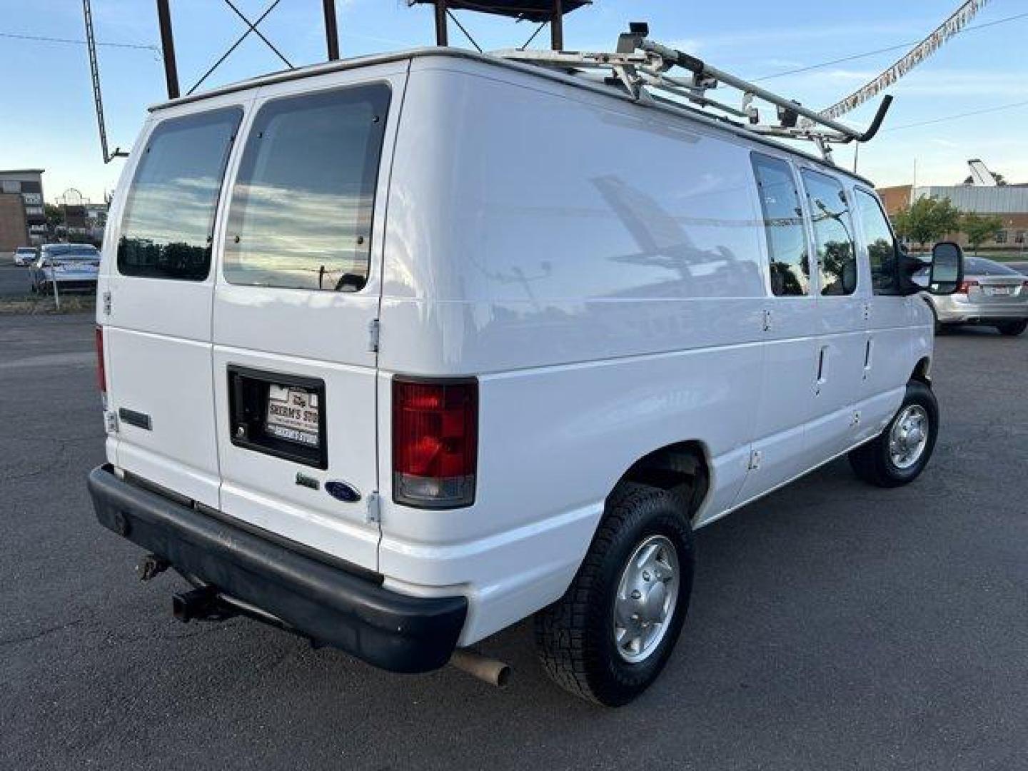 2010 Ford Econoline Cargo Van (1FTNE2EWXAD) with an 8 4.6L engine, Automatic transmission, located at 3240 Washington Blvd., Ogden, 84401, (801) 621-7177, 41.204967, -111.969994 - *2010 Ford Econoline Cargo Van E-250*This Cargo van is awesome! It has low milage (68,849) and drives great. It has a roof mounted ladder rack and inside its got utility shelves and bins for all of your gear!Equipped with a tow hitch and Tekonsha Voyager brake controllerSherm's Store is a family own - Photo#4